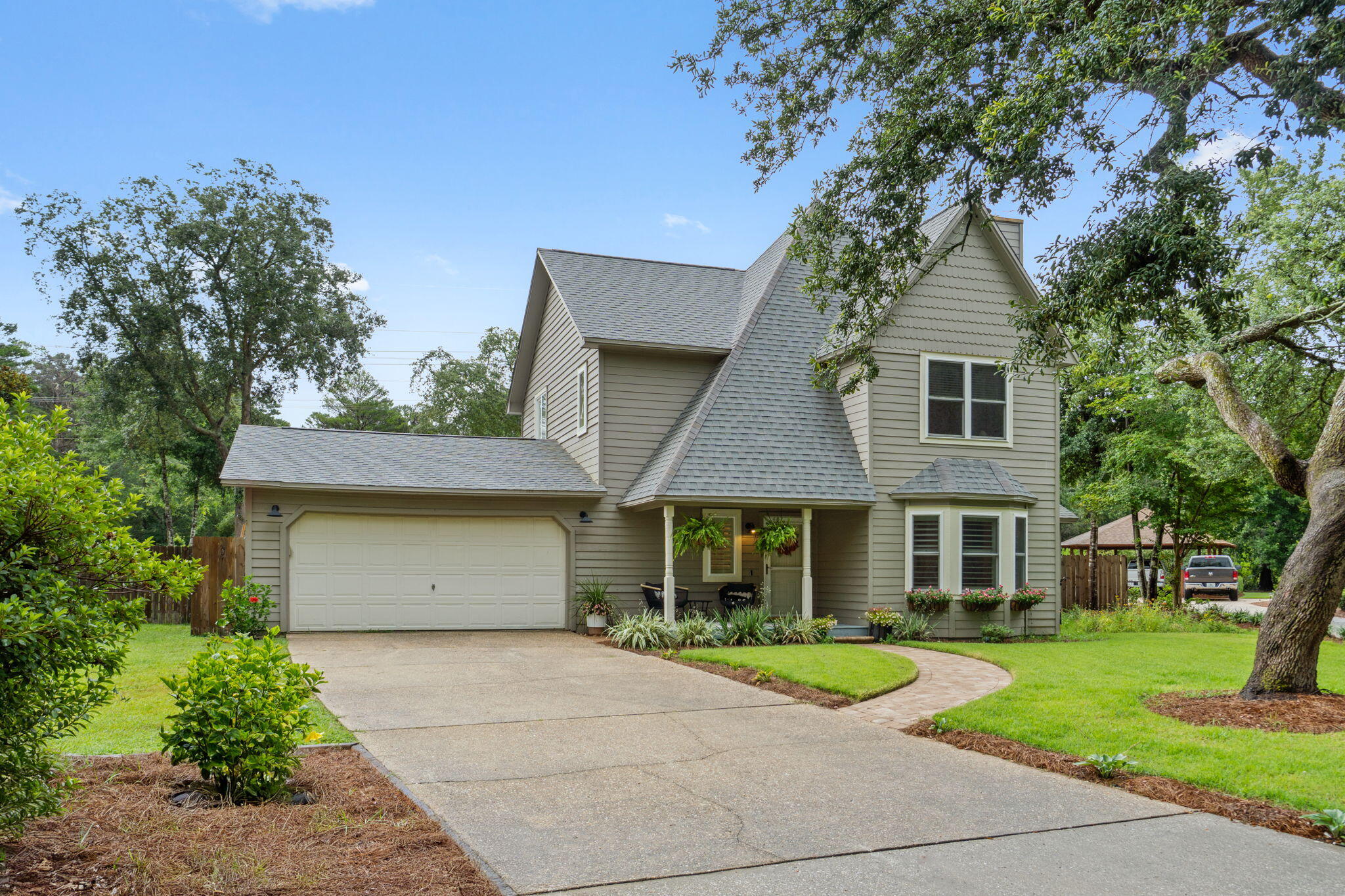 **Exceptional POOL home in Bluewater Bay! ** Welcome to the fairy-tale like 505 Greenwood Cove. A beautifully updated 4 bedroom, 4 full bathroom custom home, nestled on an enchanting cul-de-sac in the coveted community of Bluewater Bay. Over 2400 square feet of thoughtfully designed living space, this residence offers a perfect blend of elegance, style, and resort-like amenities. Enjoy endless summer nights in the enchanting outdoor oasis: private, fenced .37acre grounds with mature trees, lush greenery, flower gardens, saltwater pool, and a delightful fire-side lounge. The main living space is the heart of the home. The chef inspired kitchen includes high end stainless steel appliances, stylish lighting, and custom cabinetry, with soft close drawers.... The waterfall quartz countertops and backsplash add a sleek touch of modern luxury while enhancing the timeless warmth of the cherry wood cabinets. The recessed living area creates a unique architectural focal point and cozy conversation zone around the wood-burning fireplace. Bay windows, sunny breakfast nooks, built-in coffee & wine bar, shiplap & custom lighting create a truly magical ambiance.
Other upgrades include new flooring, new lighting, new fans, & new paint throughout the home. All-new renovated bathrooms, new wood deck & lush landscaping. This home is a must see to experience. Schedule your private tour today!
All kitchen appliances, wine refigerator, Washer/Dryer, & the mounted TV in the living room convey.
There is an additional washer/dryer hookup in the second master bedroom closet. HVAC 2022, water heater 2021, Roof 2014.