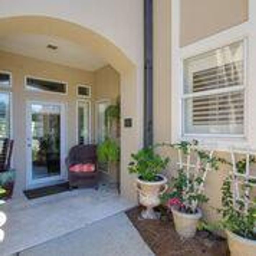 PRICE REDUCTION - MOTIVATED SELLER!! Breathtaking views of the lake and golf course from 3 sides of this end unit. Ground floor unit with no stairs inside or out. Enjoy the sunsets and fireworks in the Village from the porch swing on the screened porch. Updated through with natural limestone floors, granite counter tops, stainless steel appliances and crown molding. Freshly painted and fully furnished. Exceptional storage in the large garage, pantry/laundry and outdoor owners closet. Large bedrooms and the master suite has a custom walk in closet and large bathroom with whirlpool tub, shower and double vanity. You should be steps from the Turnberry Assoc. pool and a short walk from the tennis center, marina, 2 golf courses and the village.