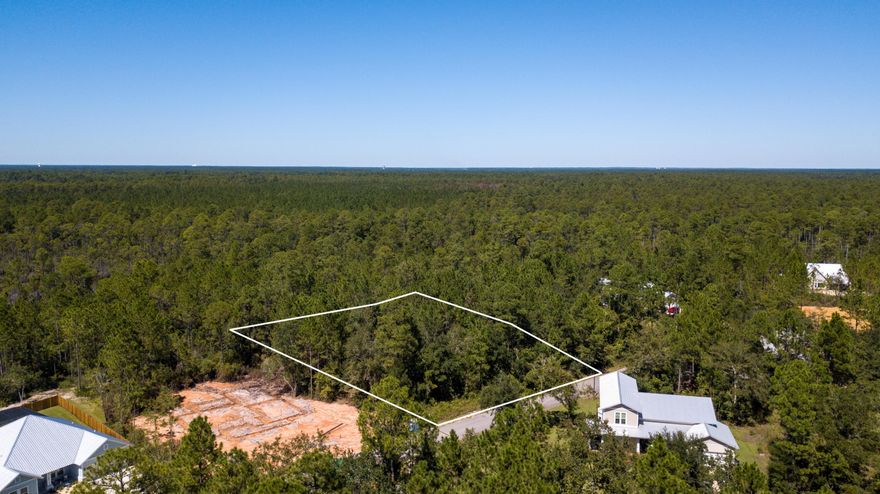 Come experience the joy of unspoiled nature and an amenity rich lifestyle at Bear Creek Cottages in Freeport. This large and exceptional homesite is located near the front of the community and is adjacent to a preserve pond adding an additional border of privacy. Bear Creek is a luxurious community offering quick and easy access to Santa Rosa Beach, Freeport and surrounding areas. The amenity rich neighborhood offers homeowners with a private gated entrance, a sports field, basketball courts, tennis and pickle ball courts, community pool, playground and access to a clubhouse.