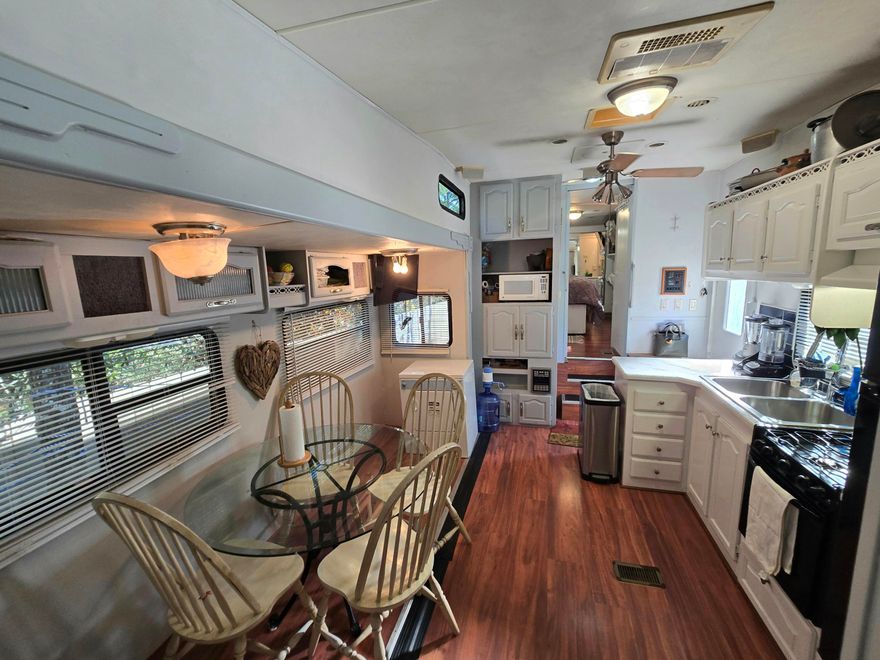 Discover the potential of this Unfinished home, paired with a utility connected RV!!! The interior has been framed for two bedrooms, each with its own private bathroom, and separate exterior access doors, ideal for rental potential or guests suites. The main portion of the home is designed for an open living/dining/kitchen social area, all rooms framed, ready for a new owner to complete it into a cozy and functional space. The onsite RV, is already connected to utilities, providing a convenient opportunity for anyone seeking to live on the property while completing the home! Highly accessible area, under 2 miles to US-90! Under 8 miles from I-10. Quick commute to downtown DeFuniak Springs, military bases, and our fluffy Destin/Miramar beaches.