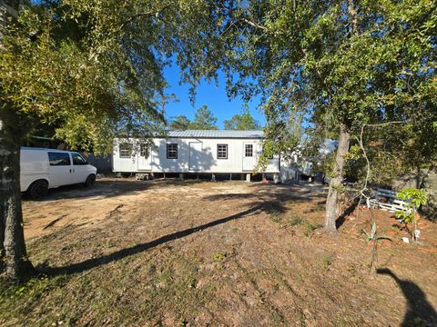 Photo of 261 E Jonquil Avenue, DeFuniak Springs, FL 32433 (MLS # 990483)
