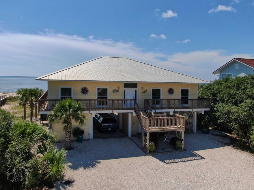 Your dream BEACH home is waiting for you to move in right on the Gulf of Mexico! Fully turn-key sold fully furnished. This one-level Gulf front home features 4 bedrooms and 4 en-suite baths  located in the heart of St. George Plantation (a master planned 1100 acre private gated community with 24-hour security, air strip, 2 pools, 2 tennis courts, pickle ball court, clubhouse and meandering bike paths and more.) that has a solid rental history with repeat customers. Current owner has kept this property immaculate with so many upgrades; including new elevator, furniture, washer/dryer, backsplash, kitchen counter top, boardwalk, culligan water system, and so much more; list is under document section. Never miss a beach sunset again. Call for a showing and make this jewel of a property yours!