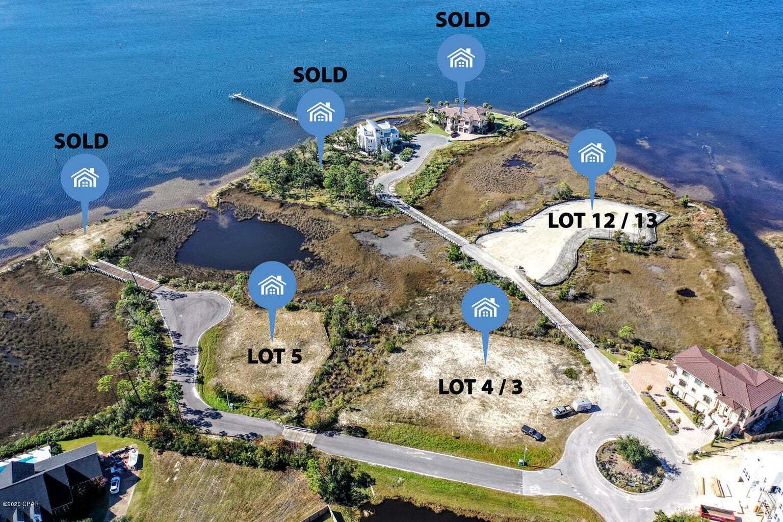 **WATERFRONT** .63 Acres - Northshore Islands, cleared, filled, level, site prepped and ready to build! The lot is a private island and has bay-front and canal front with gulf access. Docks are permitted. The aerial photography highlights the privacy, nature, views and lifestyle unavailable anywhere else. A private bridge brings you home to unobstructed, 270 degree views of the bay. and no neighbors to the right, the left, in front or behind. Come visit today!