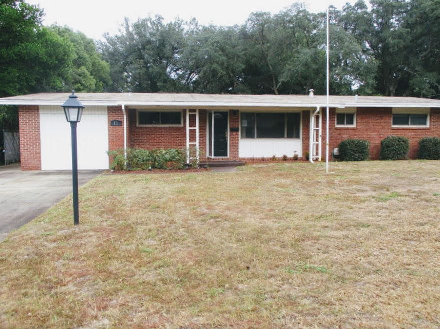 This REO is a must see. In the heart of Fort Walton Beach and a quick drive to Okaloosa Island, downtown FWB, Hurlburt and Eglin AFB, this larger 3 bedroom 2 bath home comes with tons of potential. Home needs mostly all cosmetics (fresh paint and flooring) but can easily be move in ready if desired. Home has brick exterior, dimensional shingles, tiled baths, separate den and screened in back porch. Parking is in the rear of the home and under the 2 car attached carport. A definite must see! Property is FHA (IN) insurable.