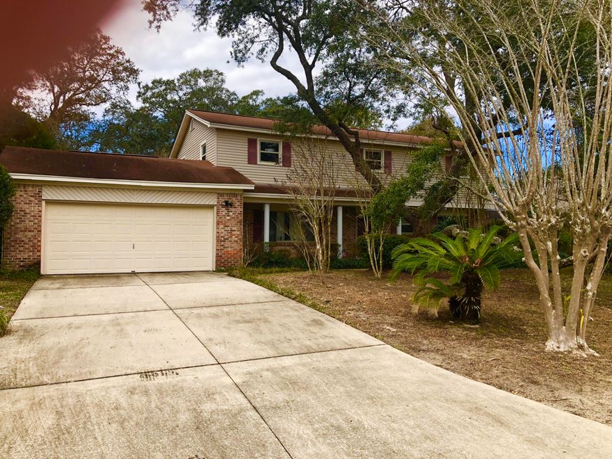 WHAT A DEAL!!! Beautiful two-storied 4 bedroom 2.5 bath home perfectly located in the heart of Fort Walton. This spacious home boasts 2544 sq. ft. on a large corner lot with beautiful mature trees. The screened in salt water pool with waterfall and patio area are great for entertaining or relaxing after a long day. Beautiful wood floors throughout all of the bedrooms. New air conditioner, tankless rinnai water heater, granite counters, are just a few of the upgrades already in place. This could be a great family home for years to come.....