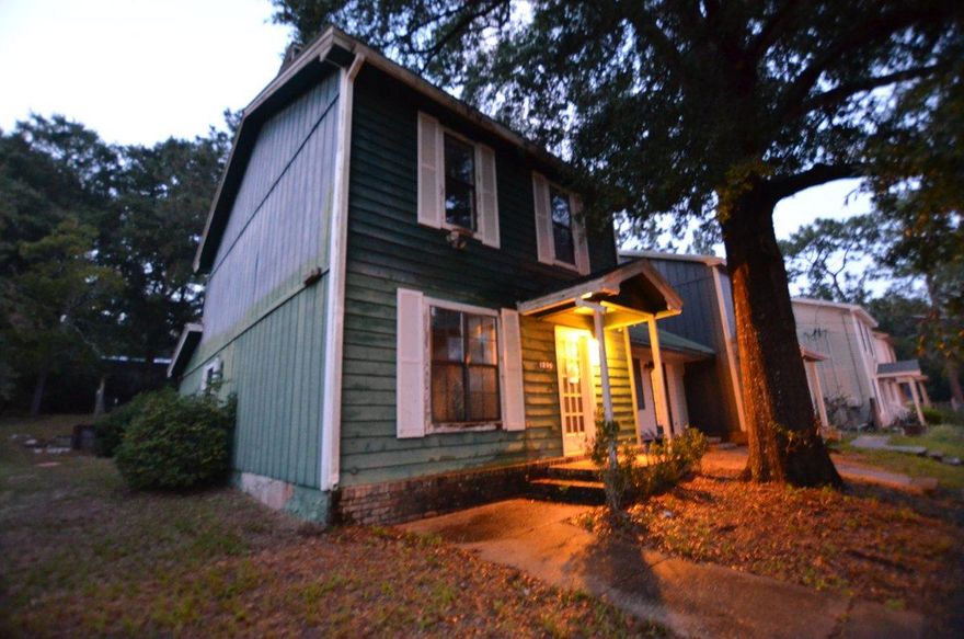 Opportunity knocks with this conveniently located REO town home. Nestled near the center of the town of Crestview this 3 bedroom 2 bath town home is minutes from the High School and groceries to the North, and Interstate and Duke field to the south. This all wood 1484sf home was built in 1982 and comes with metal roof, master bedroom downstairs, fireplace in the kitchen and oversized laundry /pantry just off the kitchen. Upstairs the remaining 2 baths share the jack and jill bath. This home has tons of potential and of course, opportunity! Call today before it is gone!