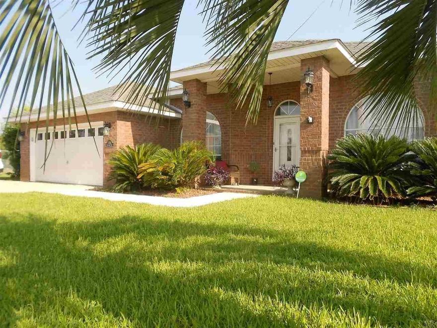 Experience home life in a modern sanctuary of privacy and comfort! This home says, Polished & Refined with the many upgrades over the last 5-years. Enjoy a refreshing swim in the 16' x 30' heated saltwater pool; entertain under the covered and screened pool patio with two paddle fans. Bring an extra family-member to live in the attached in-law suite; in-law suite is complete with a separate entrance, kitchen, bath and laundry. The extra living area could also be converted to a separate rental space, offering the new owners a residual monthly income. Easy parking with the 2-car garage and expanded 3-car driveway. Stay Green and be energy efficient with the GE Hybrid hot water heater installed in 2014. Schedule a time to show this home today!