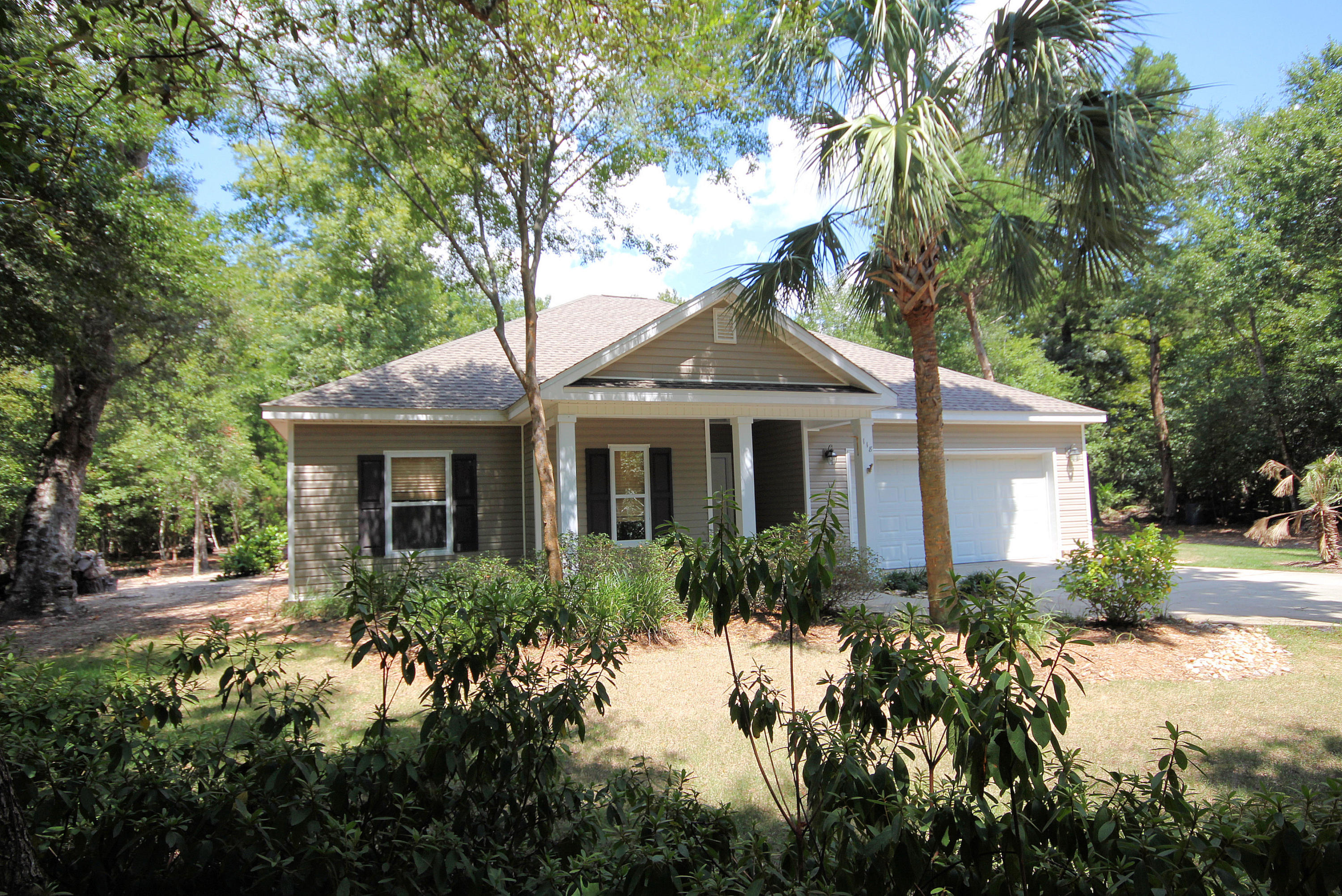 This handsomely appointed 1702 sq. ft. property features vinyl exterior accented with grander landscaping providing you the privacy that you may desire. A special feature of this 3 bedroom, 2 bath home is an extra room that could be your office and an additional room that could be a mud room, exercise room or perfect for your hobby creations. The Great room opens to the kitchen offering you room for all of your entertaining needs. The kitchen design is finished with maple wood cabinetry with an overhead plant shelve to display all of your favorite treasures. Appliances include a smooth top stove, microwave, dishwasher and refrigerator. Complementing the maple cabinetry is 20 ceramic tile floor laid diagonally offering your home that special touch.