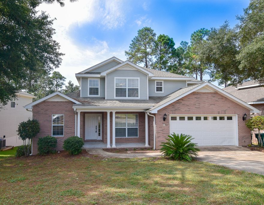 Welcome home to this 4/2.5 home with open floor plan which features a great room with dramatic two story ceiling, crown molding, and gas fireplace. The ''swing room'' off the foyer can be used as a formal dining room, living room or office/study. The kitchen includes granite countertops, stainless steel appliances and an oversized breakfast area large enough for family dining. The master bedroom, swing room and kitchen have 9 ft ceilings. The master bath features a whirlpool tub, double vanity and large separate shower. Three bedrooms are found upstairs, along with a bath with a double vanity and a large climate controlled storage area. A large covered porch provides an outdoor living area and the laundry room includes space for a freezer. Click More for additional information!