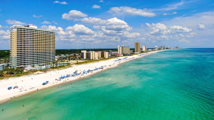 UPDATED, LOW FLOOR, GULF FRONT, 1BD/1BA CONDO PLUS BUNKS in HALLWAY in Beautiful Boardwalk Central! New flooring in master suite. New AC 2020. New Hot Water Heater 2019. Recent Updates: Washer/dryer, refrigerator, furniture, flooring & accessories. Granite counter tops. Tastefully decorated with just the right beach decor. Unit centrally located over the fabulous tropical gulf front pool nestled in the midst of palm trees overlooking the World's Most Beautiful White Sand Beaches & Emerald Coastline. Lowest priced 1BR condo listed! Boardwalk boasts of it's architectural design, grand entrance into the lobby, extra large community room leading to the paved deck around the pool with beach access. Lagoon style pools, hot tubs, tiki bar, exercise and sauna room. Full Time Security at the entrance. Conveniently located to marinas, dining, shopping and entertainment, Walmart, Gift Shops & Pier Park Shopping Center. The best part is this unit is rental booked for the summer & into the fall already. You can start making money the moment you close on this Beautiful Beach Front Oasis. Don't miss out on this one!