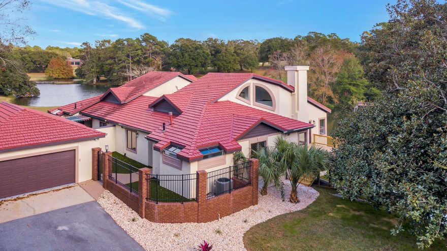 This home is absolutely stunning! It is COMPLETELY UPDATED with a beautiful lake front view and so much natural lighting throughout! It includes 3 renovated bathrooms, one of which is a huge master bathroom with a gorgeous free standing tub. The master is on the main floor, as well as one other bedroom & full bath. The kitchen has all new appliances, gas stove, and quartz countertops. The main area has many windows facing the lake, and has TWO decks off of it. Upstairs you will find a third bedroom and full bath, alongside a large walk in closet (this house has so much storage space). Rare in Florida, there is a basement featuring a walkout. There is also a new tankless water heater. BUYER TO VERIFY ALL MEASUREMENT