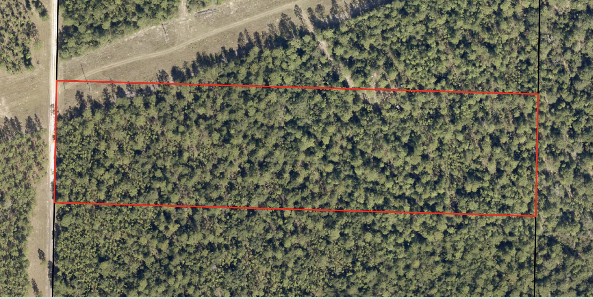 Bring your build plans!! This 10 Acre parcel is prepped for your new build to start! The front 2 acres are already cleared with a driveway and electric ran to the property ready to be hooked up with Chelco. County zoned as agricultural. Perfect spot for your forever home! Easy Access to Highway 90, Short drive to local beaches, entertainment, shopping centers, and Military bases. Enjoy fishing on the nearby blackwater river! It's time to build your dream home! Call your favorite realtor to tour the property!
