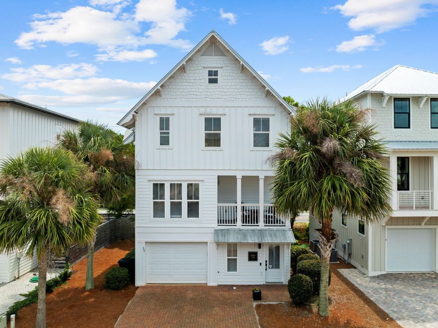 Oozing character and curb appeal, this fully remodeled Florida cottage is superbly located directly on Scenic Highway 30A. Just one block from the nearest beach access, it's within walking distance of the restaurants and shopping at Gulf Place. Designed with a reverse floor plan, this tastefully updated home has new flooring, fixtures and fresh paintwork in muted tones. It benefits from an open-concept kitchen and entertainment space on the second floor. Granite counters, stainless appliances, and fresh white cabinets provide everything you need, whether this is a permanent residence or a second home. Head out onto the second-floor balcony and enjoy reading and sunset drinks before dinner.  The separate dining room area has an additional balcony for outdoor entertainment. On the first floor, there's a master bedroom, a private bathroom, an owner's closet and a one-car garage for storing bikes, a golf cart and beach gear. The third floor accommodates three additional guest bedrooms with a family bathroom and a private ensuite. Rounding off the well-planned design, the home is brimming with storage and has parking for two cars on the paved driveway. Located in the popular Gulf Heights area, there is no HOA. Available fully furnished and turnkey, the home boasts many extras, including a new hot water system and an ultraviolet air purification system installed on both HVAC units in 2023 (downstairs unit) and 2024 (upstairs unit). 