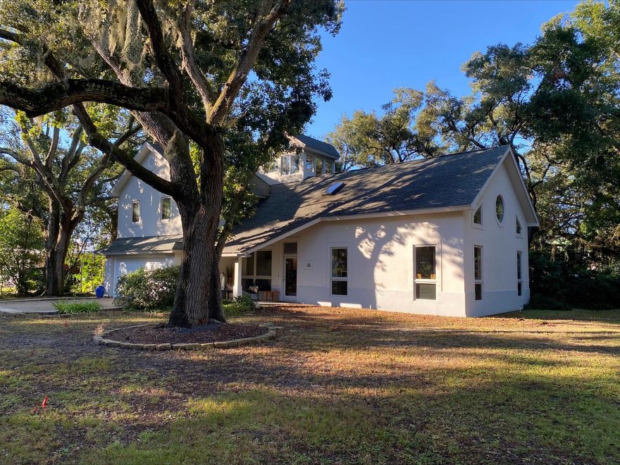 Elegant Custom Home with Pool on Oversized Corner LotSurrounded by majestic oak trees on an oversized corner lot, this stunning custom-built home offers comfort, craftsmanship, and classic Southern charm. Perfect for entertaining, the property features a screened-in pool, a private lane with additional parking, and rich New Orleans flair--including a hand-laid brick walkway and an authentic NOLA fountain.Inside, the first floor welcomes you with soaring ceilings, custom built-ins, and gleaming maple hardwood floors. The spacious living and dining areas are bathed in natural light from numerous wood-clad windows, doors, and a skylight. The gourmet kitchen is a chef's dream, showcasing a five-burner Viking range, granite countertops, a large island, stainless steel appliances, an under-stair pantry, and counter seating for six or more.

The first-floor master suite offers private pool access, dual walk-in closets, and plenty of space for a cozy sitting or reading area. Upstairs, a versatile loft with a built-in entertainment unit provides the perfect retreat for guests, family gatherings, or a playroom. Three additional bedrooms include a jack-and-jill bath, an ensuite bath, generous closets, extra storage, and a convenient laundry chute to the first-floor laundry room.

Accessible by ladder, the third-floor crow's nest is a true gemsurrounded by windows and treetop views, it's ideal for an office, reading nook, or creative space.

Thoughtfully updated and hurricane-hardened by ReBuild Northwest Florida in 2016, this home includes hurricane shutters, new HVAC systems (2016-2017), a new roof (2017), and new quartz countertops in two guest bathrooms and the laundry room. Pool updates include a new liner (2021), heater (2022), and pump (2024).

Located just 4 miles from Pensacola Beach, 7 miles from Downtown Pensacola, and steps from Pensacola Bay, this home offers both tranquility and convenience. As part of the Navy Cove community, residents enjoy private bay accessperfect for kayaking, fishing, paddling, and watersports.

This home is an exceptional opportunity to experience Gulf Coast living at its finest.