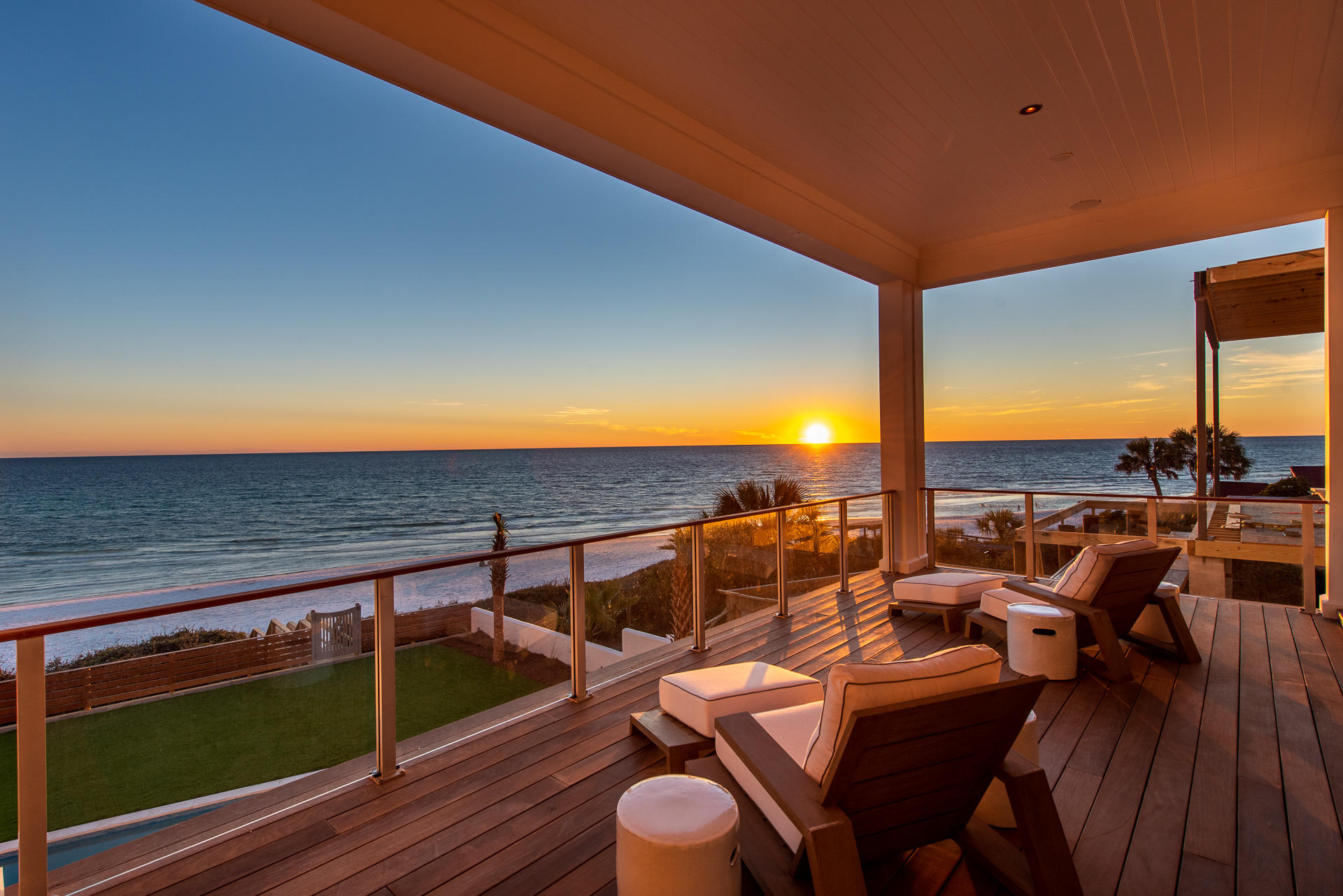 This must-see magnificent new construction beach home was just completed in the heart of Seagrove, and is truly a Gulf-front dream! Spanning over 6,906 sqft heated/cooled, this home abounds room after room with masterful design and well-appointed furnishings and finishes. You can enjoy the endless sweeping views of the Gulf's emerald waters from many rooms in this home's thoughtfully designed interior, in addition to it's three stories of outdoor spaces. The private Gulf-front pool, outdoor kitchen, and decks that span the width of the home, allow for incredible outdoor entertainment. Entering the first floor, you will find an inviting foyer, soaring 12' ceilings, an elevator servicing all 3 floors, 3 bedrooms, 3 baths, a spacious laundry