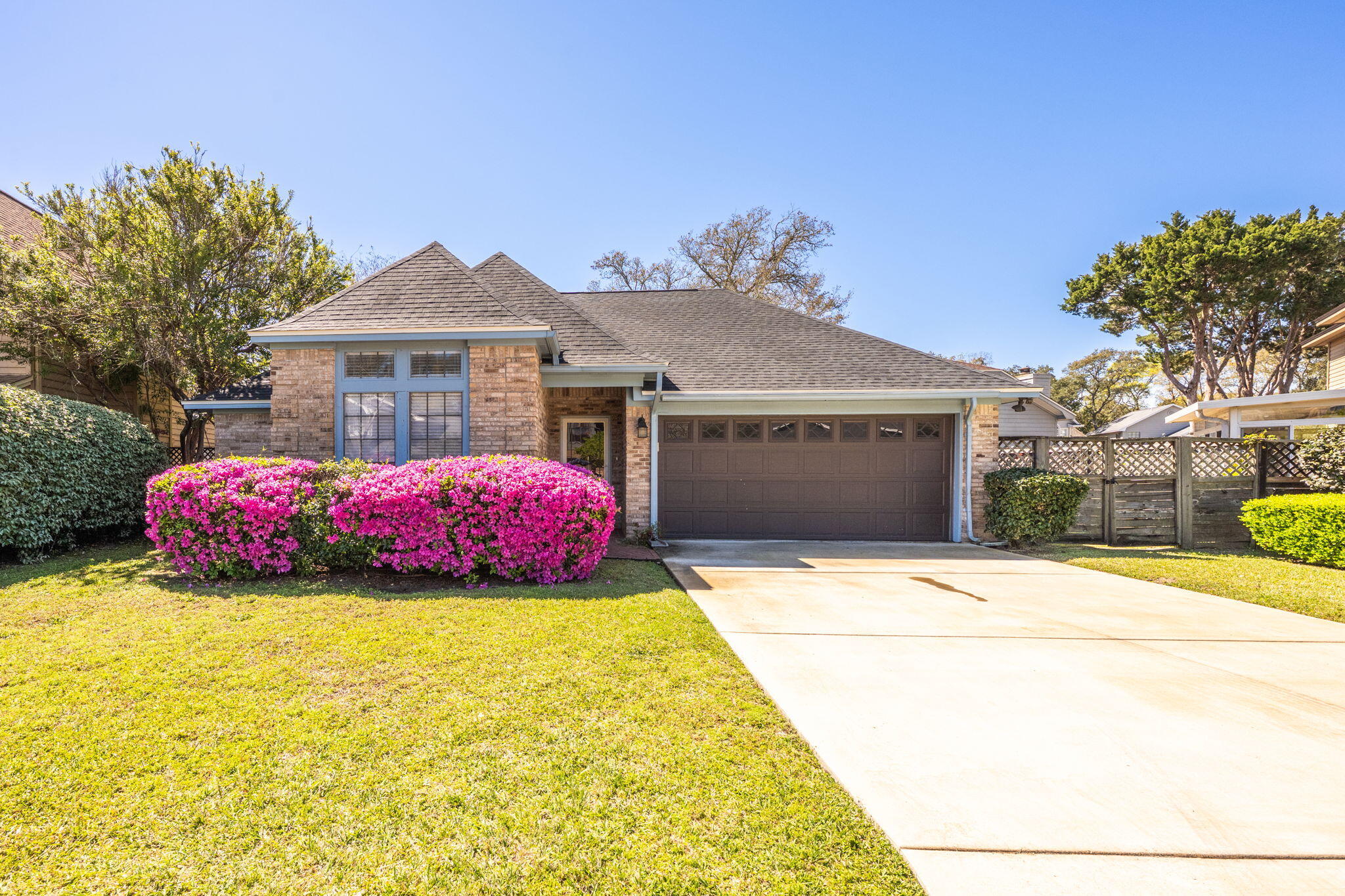 *This home is presented with staging furniture* 2025 New Roof! Located in the heart of FWB, 1505 Mariah Way is prime location for both Eglin AFB and Hurlburt Field active duty and DOD personnel. With proximity to many shopping options such as Lowes, Kohls and Sams Club on Beal Parkway and recreation activities like hiking on Timberlake Trail off Lewis Turner Blvd or fishing and swimming at the Okaloosa Island Pier, there's something for everyone. This inviting property features a new air conditioning unit and heat pump installed in 2020, ensuring comfort year-round. The master and hallway bathrooms boast upgraded faucets while the kitchen is a modern delight with smart LED lighting, track lights, a new gooseneck faucet, and a renovated vaulted ceiling. A Samsung digital microwave completes the kitchen's contemporary feel.
The home includes two efficient low-flush toilets and a Florida porch with several upgrades: a new roof, tile flooring, a storm door, and hurricane-resistant windows. French doors in both the Florida porch and master bedroom enhance the home's charm. Step outside to enjoy a new outdoor deck, fresh fence lattices and boards, and a Bluetooth-controlled sprinkler system with six sprinkler heads. The property also features a new concrete driveway and a modern garage door with keypad access for added convenience.