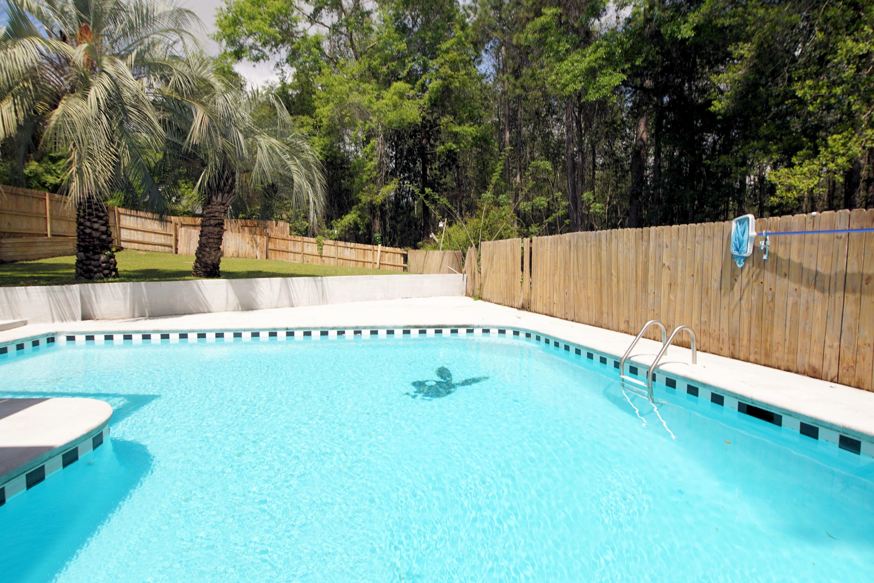 Beautiful split level pool home in south Crestview is the perfect place to call home. This home has recently been updated in the last few years. The main level features a large kitchen with white cabinets, a large center island , eat in dining area,a large breakfast bar and tile floors. The kitchen overlooks the living room with hardwood floors and sliding glass doors leading to a wrap around balcony overlooking the yard and pool. The master suite is also on the main floor and is your own private retreat! The bedroom features a gas fireplace, sitting area, doors leading to the balcony and an ensuite bathroom. The master bathroom has a garden tub, separate shower and double vanities. A large walk in closet is also a feature in the master bedroom. Heading downstairs you