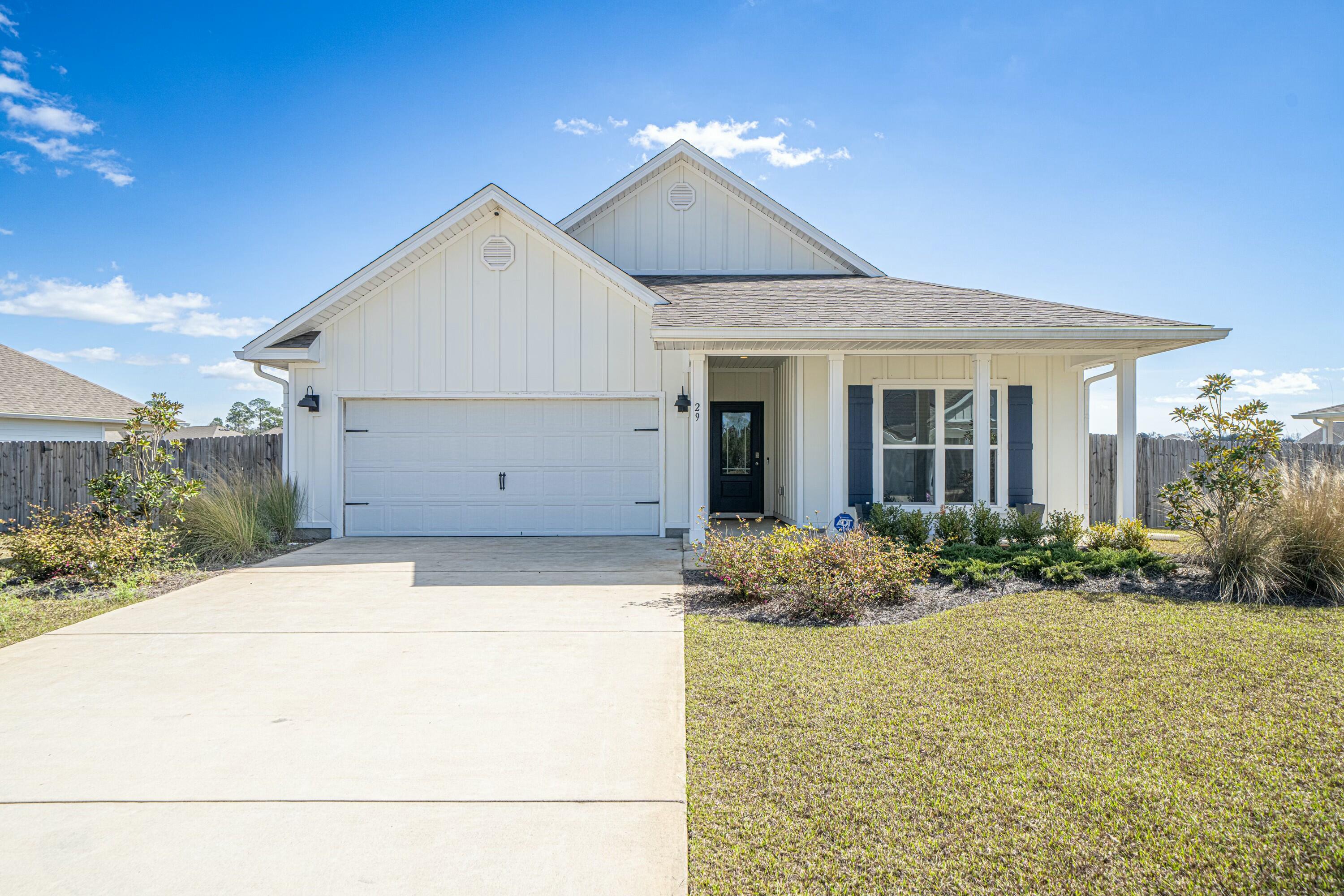 **$10,000 towards buyers closing costs!***Fresh interior paint!*Welcome to 29 W Oak Trees Lane, a stunning single-family home built in 2023. This modern residence offers 2,018 square feet of thoughtfully designed living space, featuring 4 spacious bedrooms and 2 well-appointed bathrooms. As you step inside, you'll be greeted by 9-foot ceilings and an open concept that flows right through the home. The heart of the house is the gourmet kitchen, boasting ivory shaker-style cabinetry, sleek quartz countertops, and stainless steel appliances. This culinary space effortlessly transitions into the open-concept living and dining areas, creating an inviting atmosphere perfect for both entertaining and everyday living. The primary suite serves as a private retreat, complete with 2 spacious walk-in closets and an en-suite bathroom with dual vanities and a luxurious shower. Three additional bedrooms provide ample space for family, guests, or a home office/ bonus room.
Situated on a generous 0.25-acre lot, the property offers a spacious fenced in backyard with double gates, ideal for outdoor activities or future enhancements. You can enjoy your screened I back patio all year long. Also, the attached garage provides convenient parking and attic access for maximal storage.
Located in the vibrant community of Freeport, this home is just a short drive from local schools, shopping centers, and the beautiful beaches of the Emerald Coast.