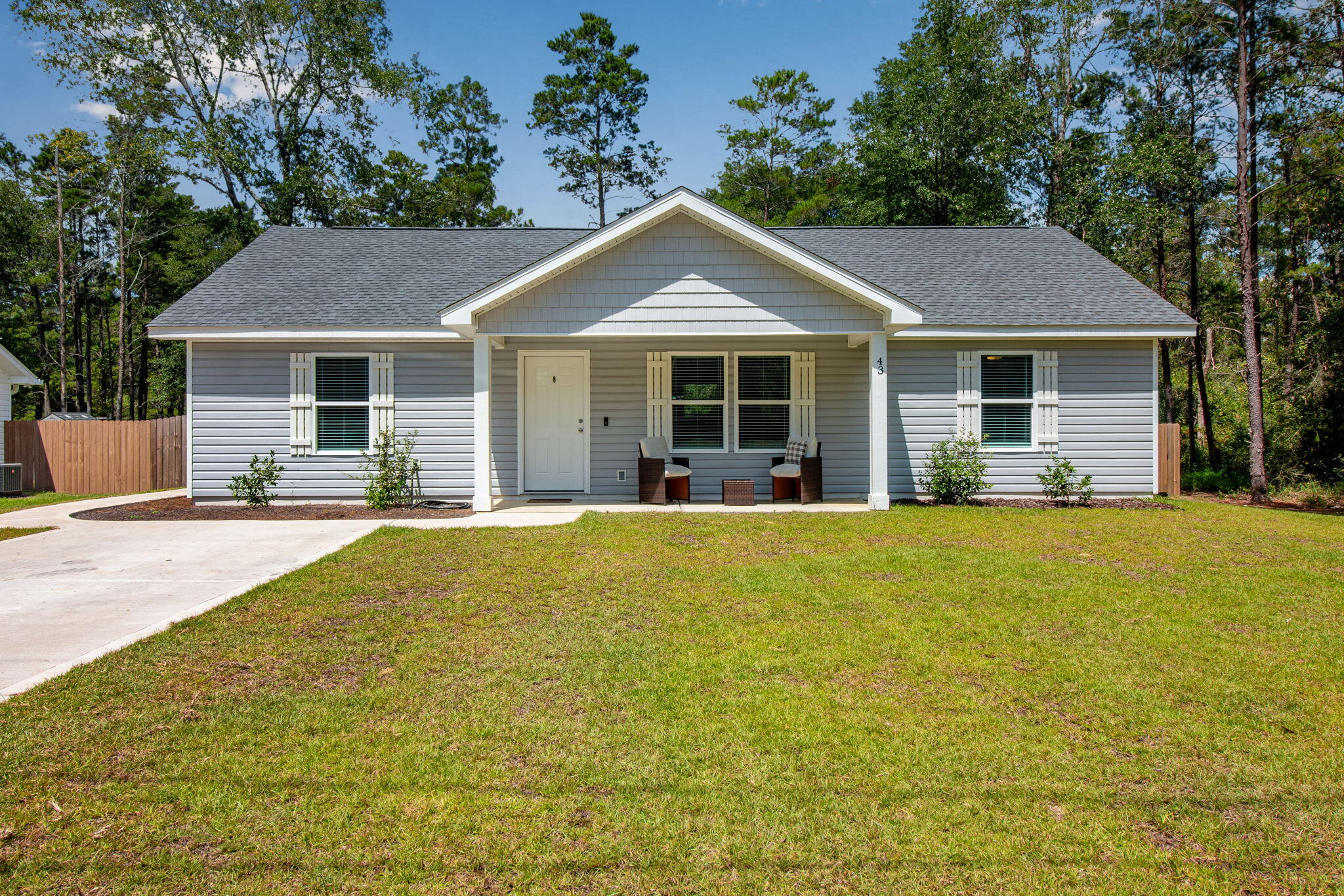 This like-new 3 bedroom, 2 bathroom home in DeFuniak Springs combines modern finishes with comfortable living. High ceilings and abundant natural light create a bright, spacious feel throughout.The open kitchen features quartz countertops, a large island, and stainless-steel appliances--perfect for cooking and entertaining. Beautiful LVP flooring flows seamlessly through the home, while the master suite offers a generous walk-in closet and a stylish walk-in shower.Step outside to enjoy the fenced backyard, offering both privacy and the perfect space for gatherings. Move-in ready and thoughtfully designed, this home is an ideal blend of style and functionality.