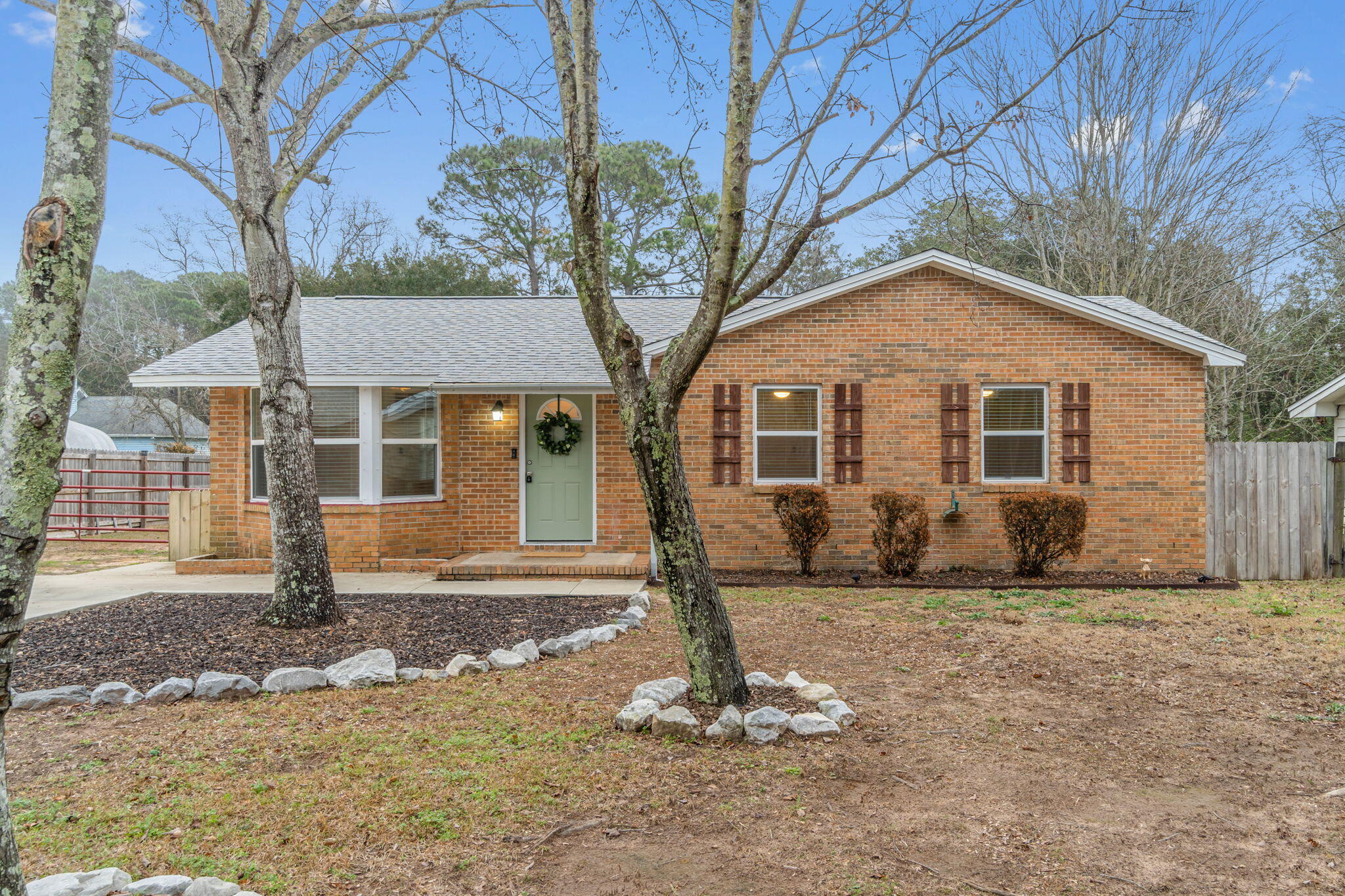**Seller to contribute up to $8000 in Closing Costs to include rate buy-down with acceptable offer!** Don't miss the opportunity to own this beautifully renovated Florida Cottage is located approximately 6 miles from Hurlburt Field and completely move-in ready! A spacious, open plan with 2 living areas and a beautifully renovated kitchen with soft close doors and granite countertops greets you as you walk in the door. The Roof, HVAC, Water Heater, AND Windows were replaced in 2019! All new ductwork was installed in 2022 to increase air flow! An active termite bond is available to transfer. A BRAND NEW, very large barn-style storage unit has been installed in the backyard. Truly a charming home with lots of great features.