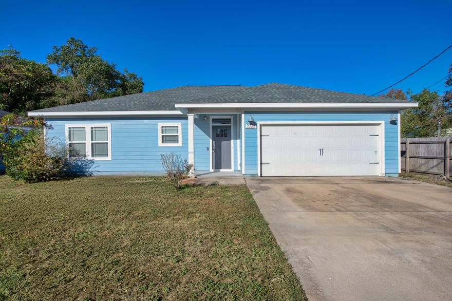 Priced to sell! Beautiful like-new home in East Navarre! Built in 2018 and barely lived in, this spacious home boasts an open-concept living area with quartz countertops, a counter-height bar, and premium plank tile flooring. The primary suite offers a custom closet with built-ins and a private bath. Enjoy the screened back porch, perfect for relaxing bug-free! Plus, solar panels paid off with a full-price offer and a $3,000 carpet allowance make this home an incredible value!