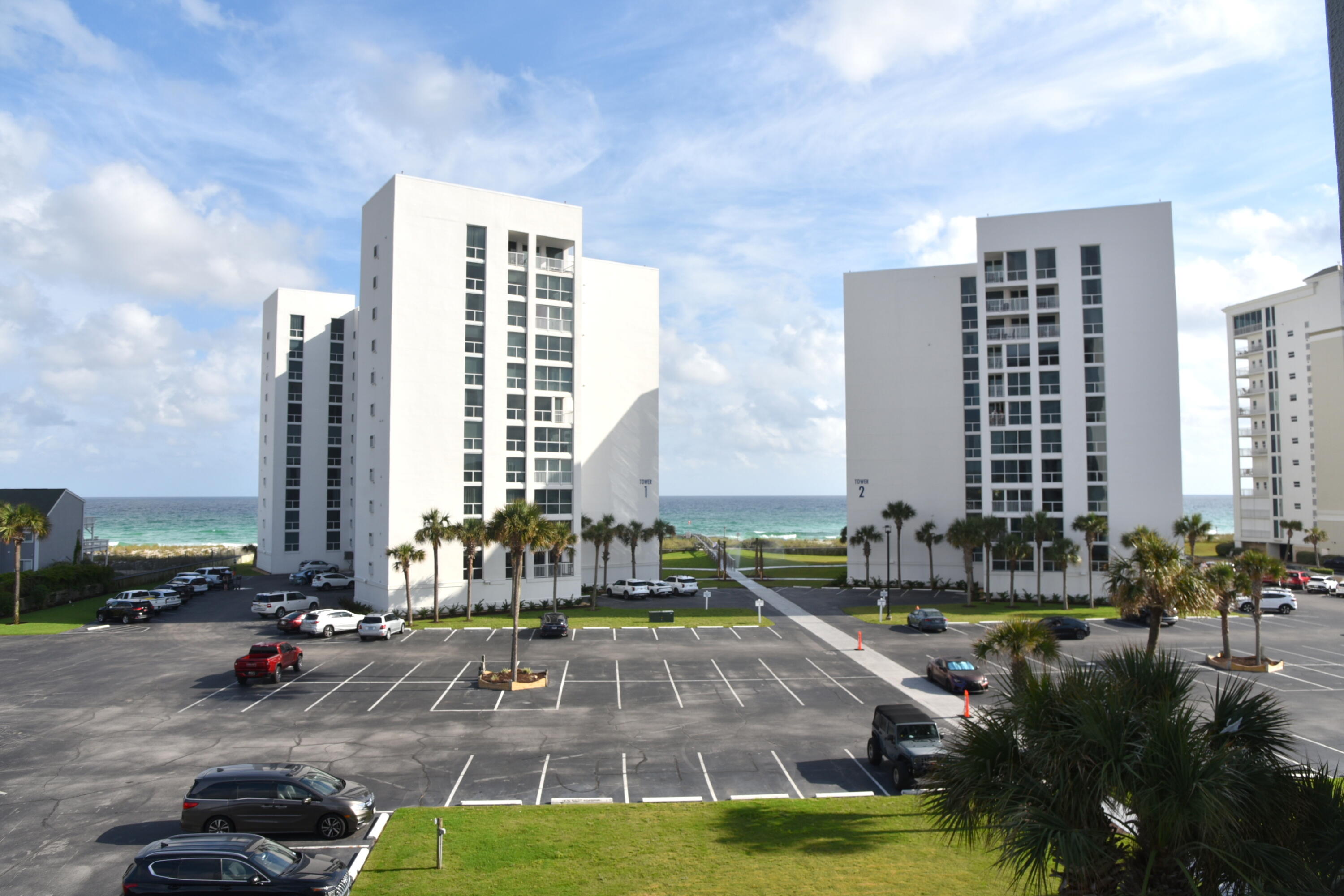 Welcome to this beautifully renovated 2-bedroom, 2-bathroom condo at Shoreline Towers, where luxury meets coastal living! Situated on the Gulf of Mexico, this tastefully decorated unit offers breathtaking views from the balcony and is the perfect retreat for those seeking both comfort and style. Step inside to discover an inviting open floor plan with luxurious LVP flooring throughout. The spacious kitchen is a chef's dream, featuring upgraded cabinets, stainless steel appliances, granite countertops, a stylish backsplash, and an ice maker - everything you need to prepare delicious meals and entertain guests in style. Both bathrooms have been completely renovated with new vanities, stunning tile floors, and elegant subway tile surrounding the tub - offering a spa-like feel in the comfort of your own home. The Shoreline Towers community has just completed an impressive $25M renovation, ensuring the entire complex feels brand new. With private beach access, tennis courts, a community room, sauna/steam room, and a sparkling pool, there is no shortage of amenities to enjoy right at your doorstep.
The condo is perfectly located, just 2 miles from The Harbor & Harborwalk Village, home to an array of dining options, lively bars, watersports, deep-sea fishing excursions, dolphin cruises, and much more. This unit has only been used by its owners, family, and friends, making it in pristine, move-in-ready condition.
Whether you're looking for a vacation getaway or a full-time residence, this immaculate gulf-front condo offers the perfect blend of luxury, convenience, and breathtaking views. Don't miss the chance to make this wonderful unit your own!