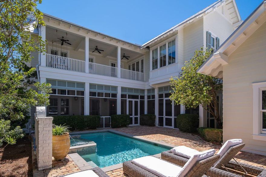 Come see what happens in the rare instance of when luxury, elegance, sophistication, class and location meet at the beach. Seeing is believing and you should see this stunning home in the coveted community of WaterColor just across from an expansive wooded open space! This beautifully crafted home features several thoughtful touches and custom details that are apparent from the moment you enter this home. Including sunken cypress wood for the French door entry way and living room doors adds to the beauty and sophistication. An arched white Chicago brick foyer with antique oak beams over the doorway greets you. There are additional beams in the first-floor family gathering room along with an antique ceiling of poplar and pine that are all estimated to be over 150 years old.CONTINUED:
