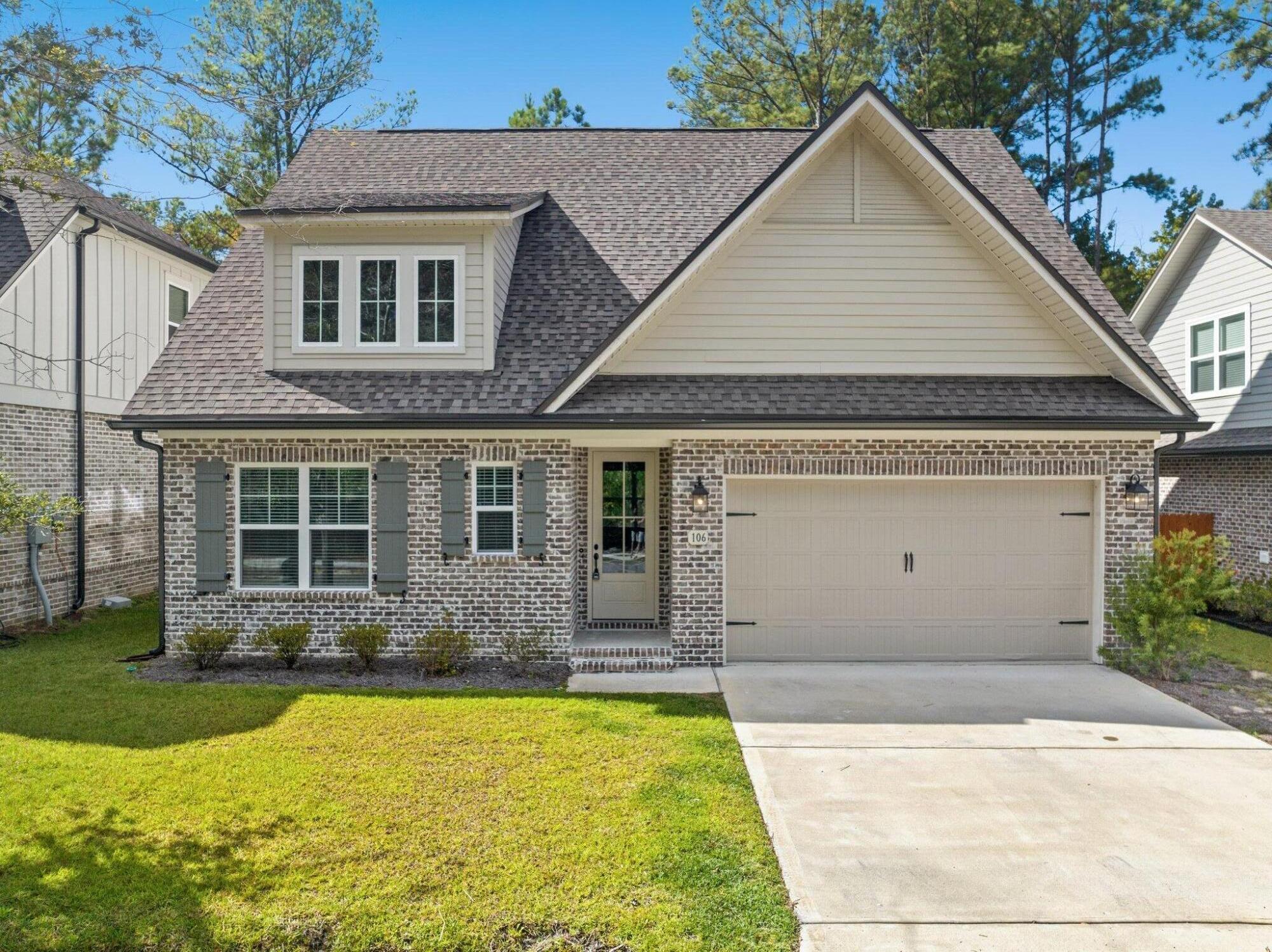 The Redfish floor plan has 2193 sqft with 4 bedrooms plus a flex room, and 2.5 baths. Interior finishes include 9 ft ceilings, laminate, tile, and carpet floor coverings, brushed nickel fixtures, and a double vanity and walk-in closet in the master bath. Some of the upgrades include 8' interior doors on the first floor, large tiled shower in the Master bath, crown molding and cased windows on the first floor, floor plug in the family room, laminate in the flex room, upgraded granite countertops throughout the home, backsplash in the kitchen, a tray ceiling in the Master Bedroom with crown molding, and 12 lite painted 8' double French doors in the flex room. Fenced back yard. This home is turn key!