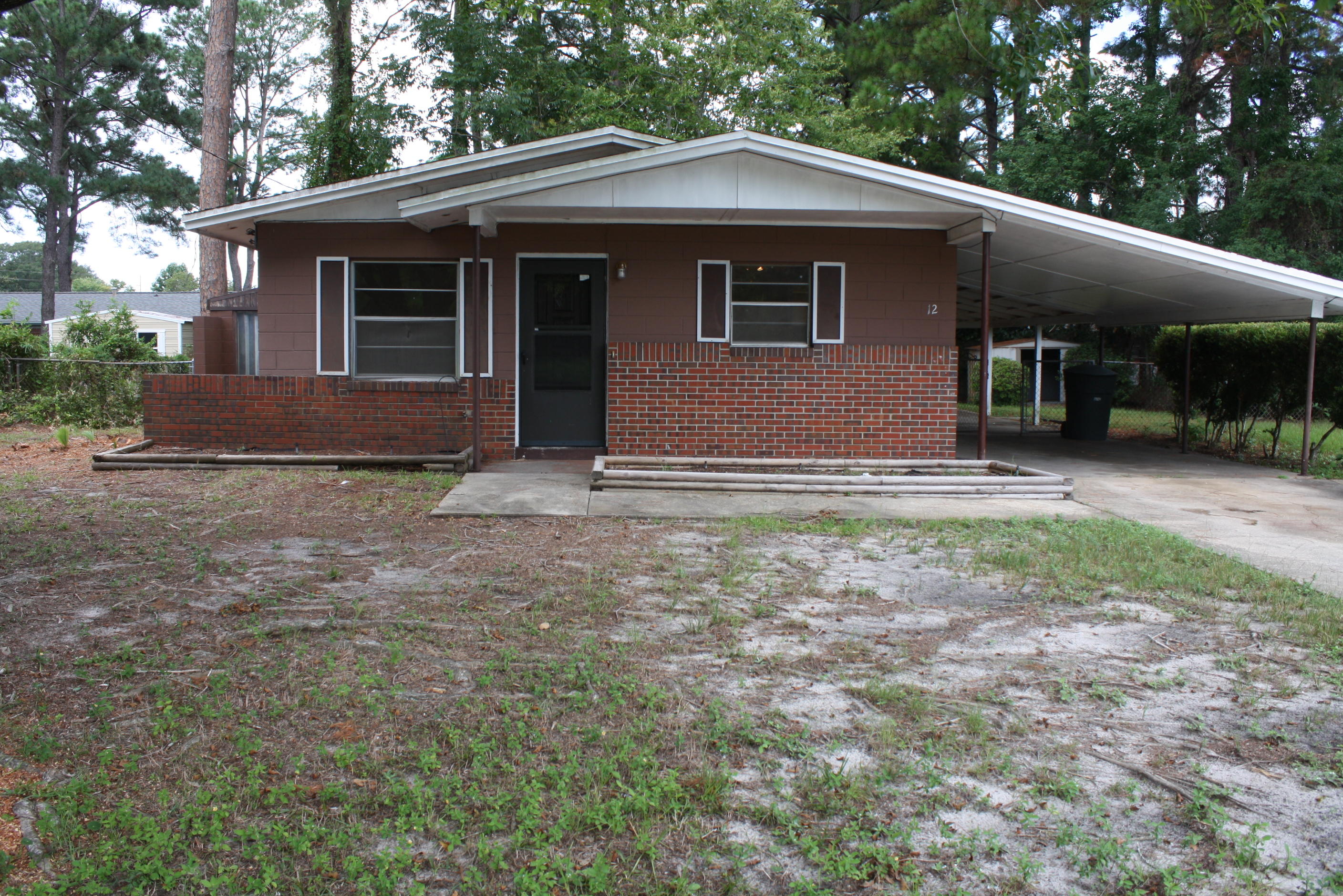 This three bedroom, 1 bath home is in a perfect location! As you enter this property you will be pleased with the newly painted, neutral walls and tile floors throughout. The living room and all bedrooms feature ceiling fans. Kitchen has wood cabinetry, fridge, stove/oven and tile floors. There is a large laundry room with shelving that opens to the outside covered porch. The backyard is fenced and has a storage shed. This home also features a sun room and sprinkler system. All down the street from Edwins Elementary, Bruner Middle and FWB High School!