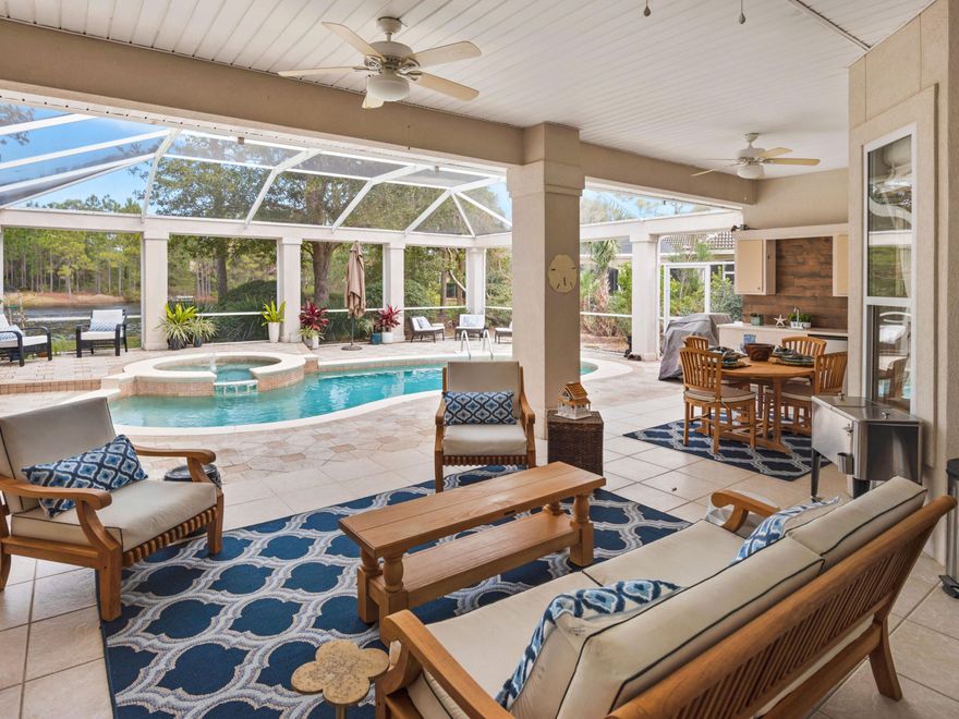 Situated within the gated community of Regatta Bay, this spacious lakeside property provides a wonderful layout, ideal for primary living as well as for those looking for a secondary home in one of Destin's most desirable neighborhoods. The interior of the home showcases a blend of tile and hardwood flooring in the living spaces, while additional features such as a formal dining room, home office, and open floor plan offer the perfect mix of traditional styling with modern day conveniences. Vaulted ceilings, a two-car plus golf cart garage, and a freshly painted interior creates a desirable coastal atmosphere within the property.