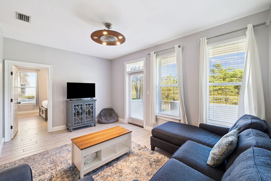 Set along the west end of Scenic Hwy 30A, this thoughtfully updated coastal condo combines modern comfort with easy access to the Gulf. Inside, the open layout features updated flooring, paint, cabinetry, and appliances, creating a fresh, turnkey environment that feels both inviting and functional. The kitchen has been completely reimagined with new countertops, sinks, and fixtures, while the primary bath was redesigned to include a sleek glass-door shower and contemporary finishes.Step through the back porch and onto the grassy common area, backing up to a trail system and state forestry. The spacious primary suite offers a king bed and private ensuite bath with a full walk in shower. The guest room features queen-sized bunks ideal for friends or family. Residents enjoy a relaxed coastal lifestyle with access to a community pool and large furnished sundeck. Beach days are effortless with direct access to Topsail Hill Preserve State Park just across the street. And when it's time to explore, nearby favorites like Stinky's Fish Camp, Stallworth Beach Access, and Dune Allen Beach Access are all minutes away.

Durable Hardie board exteriors, metal roofing, and dual-glazed windows add peace of mind and long-term value to this well-maintained community. Surrounded by nature trails, local shops, and art galleries, this home captures the best of 30A living in a convenient west-end location.