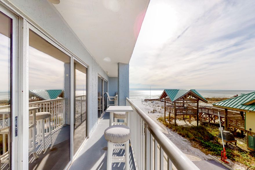 Welcome to your Island Beach Getaway! Islander Beach Resort W306 is a beautifully appointed and updated 2 Bedroom, 2 Full Bath condo with magnificent westerly facing Gulf views to make the absolute most of the stunning sunsets bestowed on Okaloosa Island. Recently renovated to include LVP flooring throughout, smoothed ceilings, new paint, updated kitchen and baths, and new HVAC in 2018. Come and enjoy this generously sized beach getaway which features an easy-living floor plan with two separate entrances for guest privacy (split bedroom plan), dedicated in-unit laundry/utility room, a wall of sliding patio doors out to the 30-foot balcony with Gulf views, well-appointed galley kitchen, and a large living area stretching the entire length of the condo.