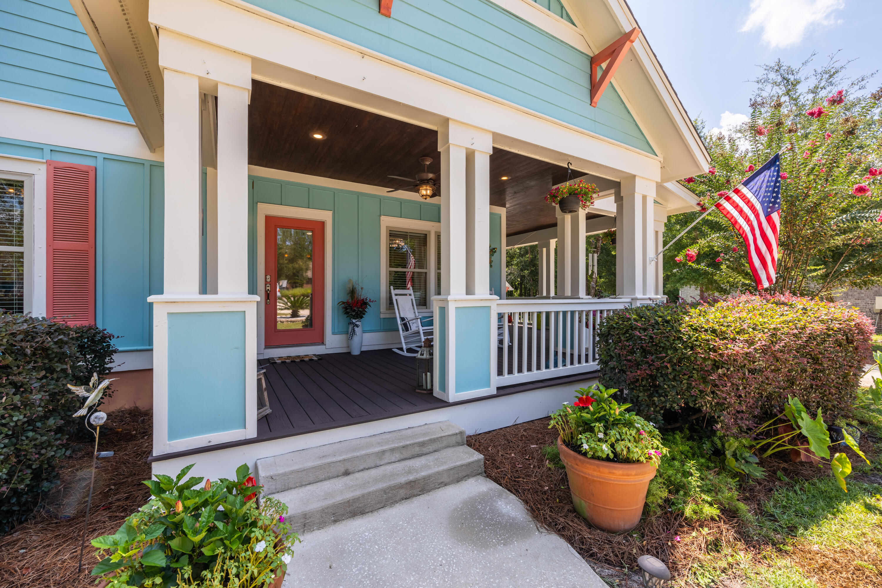This Amazing Retreat is a solid built, custom cottage style home offering beach flare and the largest wrap-around porch with separate detached garage built by Luke & Blue in Hammock Bay. This truly one-of-a-kind home is tucked away on a large beautifully landscaped amongst a cul-de-sac within the neighborhood of Symphony. This place infuses relaxation from the time you drive up. Get ready....there are endless upgrades to talk about that make this home very special!! For starters, the extra wide wrap-around porch with (3) new outdoor fans offer a lovely setting and ample space for everyone to relax, taking in the day. If you are not absorbing outdoors, then step out onto into the backyard complete with new solar lights, new paver back patio featuring