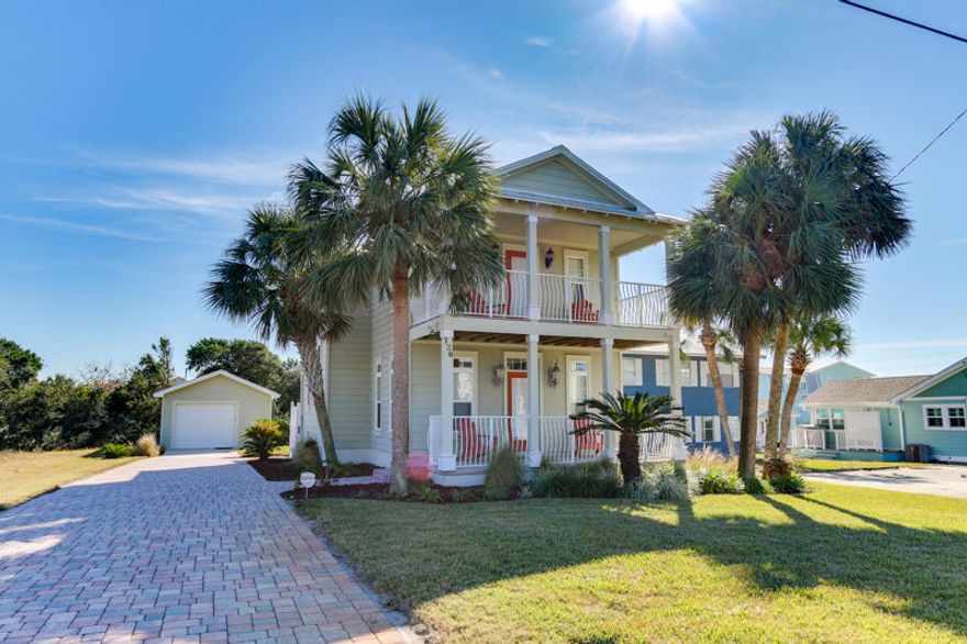 Whether you are an early riser for a morning jog on the beach, a mid-day catch-the-rays sort or one who revels in sunsets with your toes in the water, you'll love being a mere two blocks from pristine beaches and glorious pearl white sands. Your Sunnyside retreat sports charming, vibrant colors that make this a happy place to entertain, relax and call home. More... Predominantly light moss green and pebble beige earth tones commandeer the open kitchen-dining-living room concept. The breakfast bar sports granite countertops and looks into a utilitarian kitchen with stainless steel appliances and handsome pendant lights which match the chandelier over the dining table. Stylish bedrooms, closets and storage space, full bathrooms, interior panels doors and attractive furnishings make this a wonderful home choice for you, your family and guests a stone's throw from the Gulf waters.
Covered front porches on both levels, water views, 3 bedrooms, 3 full bathrooms, panel doors, tile, carpet and nice fixtures create a space that's inviting and exciting. Low maintenance was thoughtfully planned in the brick driveway, Hardie board exterior, metal roof, freestanding cedar lined garage and storage shed, tastefully painted to match. It's a sweet abode with a couple towering palms, crisp white trim and timeless appeal.


All measurements are to be verified by the buyer or buyer's realtor.