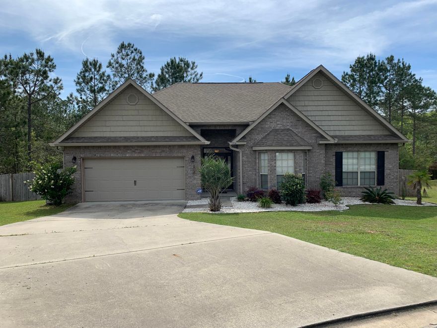 Lovely 3 bedroom 2 bath brick home in the quiet community of Rolling Ridge. This home is very open with vaulted and tray ceilings. The house sits on a little over 1/4 acre with a large fenced in backyard. The majority of the floors are laminate with some carpet and linoleum. Home backs to woods belonging to the HOA and the lot on one side will not be built on so there is nice room between neighbors. Large bedrooms and Master has large Bath with separate shower and tub and a large walk-in closet. Plenty of room for large furniture.