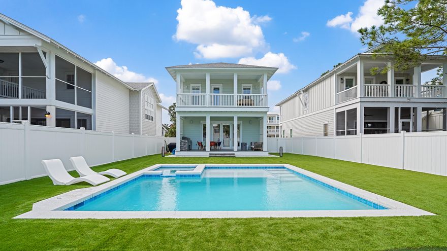 Tucked away on a private street in the heart of Seagrove Beach, 65 Sand Dollar Court presents a rare opportunity to own a fully furnished, never-rented coastal retreat just moments from the beach access.This owner-occupied residence exudes quality and sophistication, featuring rich hardwood flooring throughout, thoughtfully designed ensuite bathrooms, and timeless plantation shutters that elevate both style and privacy. Every detail reflects pride of ownership and a level of care seldom found in today's market.Step outside to a truly exceptional backyard oasis--fully fenced for privacy and designed for both relaxation and entertainment. Enjoy a brand-new heated in-ground pool, low-maintenance turf, and a custom putting green, creating a resort-style experience that appeals to all.