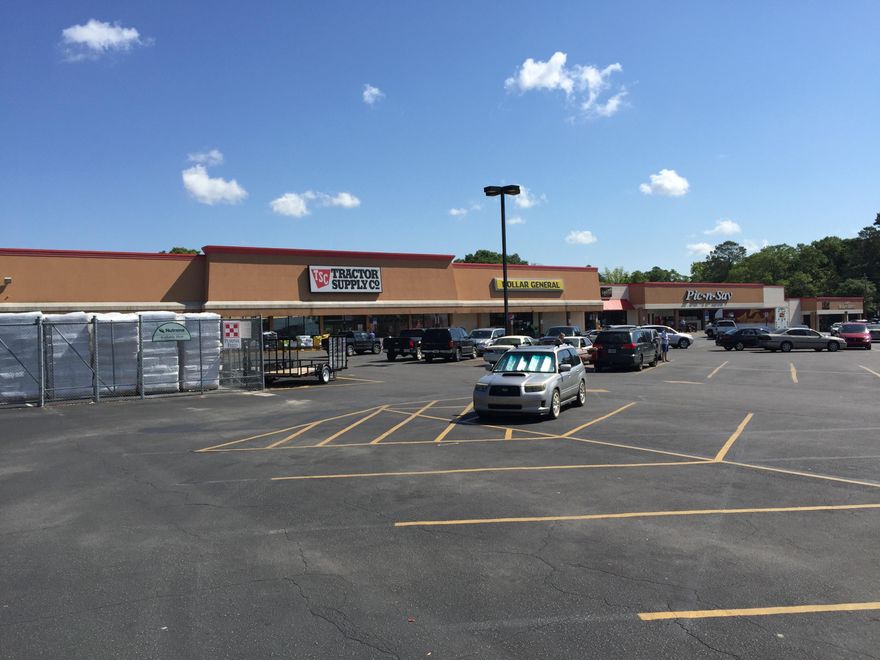 Commercial space located in the same shopping center with Tractor Supply, Dollar General, Wayne's Catfish, Soap Opera, UpBeat Music, Pic-N-Save and Kim's Beauty Supply. This space is configured as office space with cubicles and private offices. Can easily be used for retail. We can also combine this space with the adjoining space to create space totaling 3160 sf. Minimum 3 year lease.