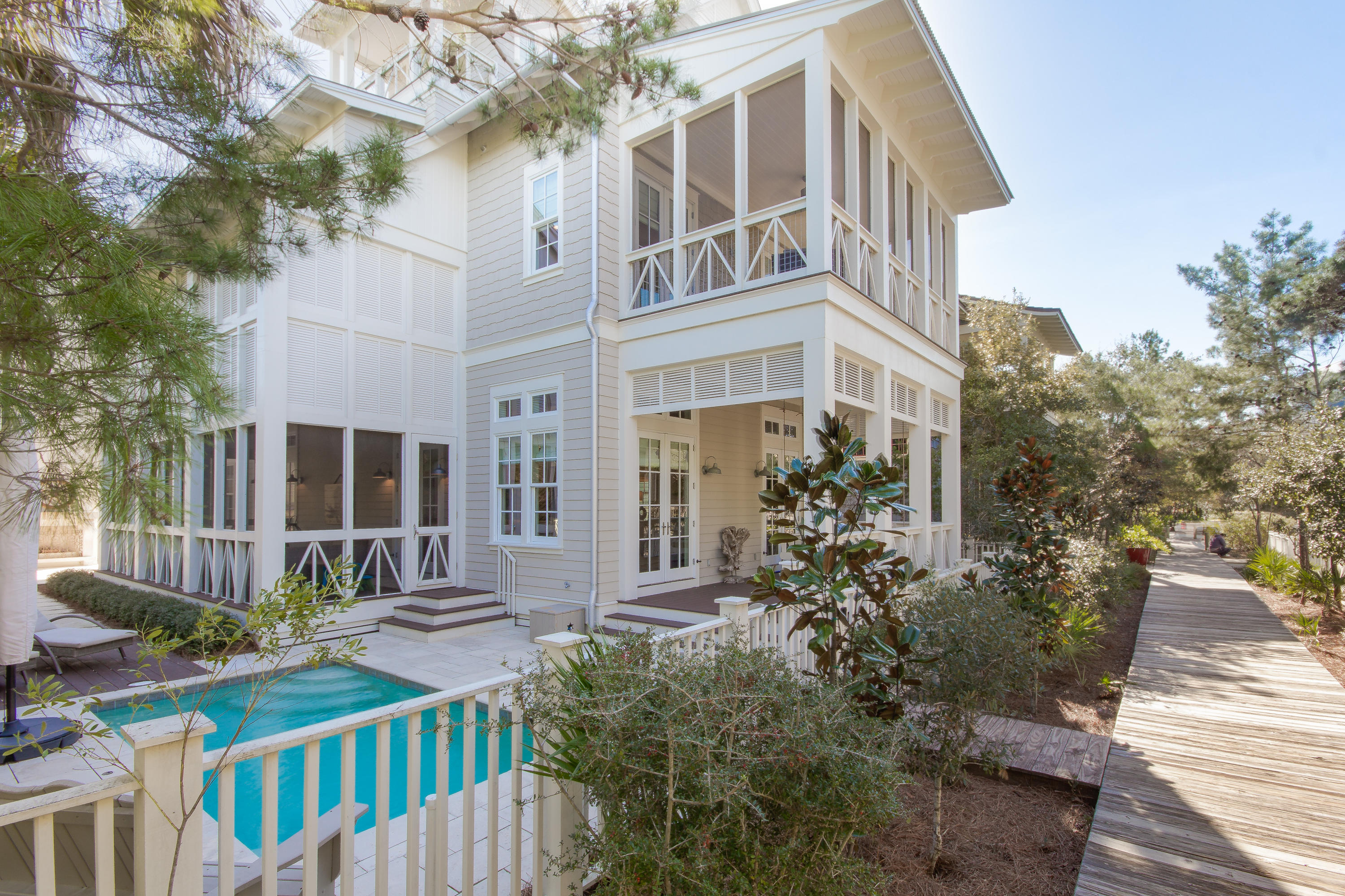 Luxury awaits you in this gorgeous new listing at 21 Founders Court. Situated in the exclusive community of WaterSound Beach, this stunning 6 bedroom 6 bath home has it all. Endless details, gracious screened porches, outdoor summer kitchen with fireplace, pool, and guest house! The tower room is fully equipped for entertaining with a wet bar, and spacious porches for great gulf view and sunsets. This is truly a spectacular home and a must see!