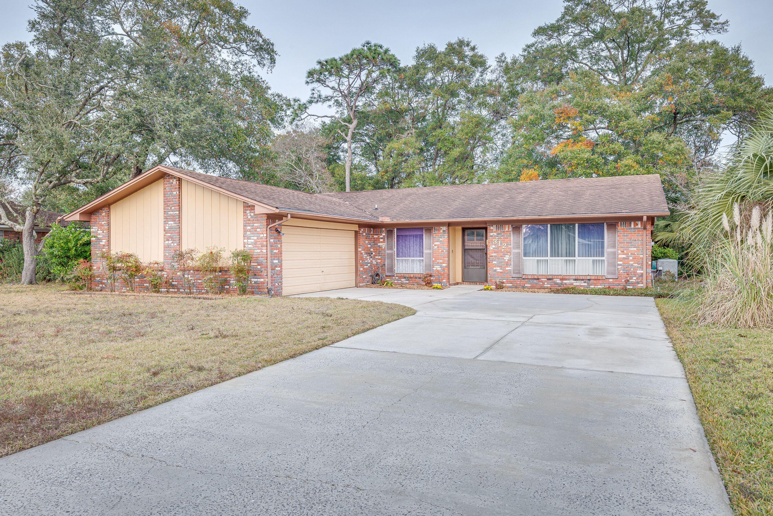 Wonderful opportunity to own this lake front home in the heart of Niceville. This home has 3BR/2BA with 1800 sf, side entry garage, electric fireplace and more. The home is 14 feet above sea level and has a sea wall. One of the only homes on the lake with lake front ownership. Enjoy your backyard with beautiful Azaleas, Magnolias and greenhouse.