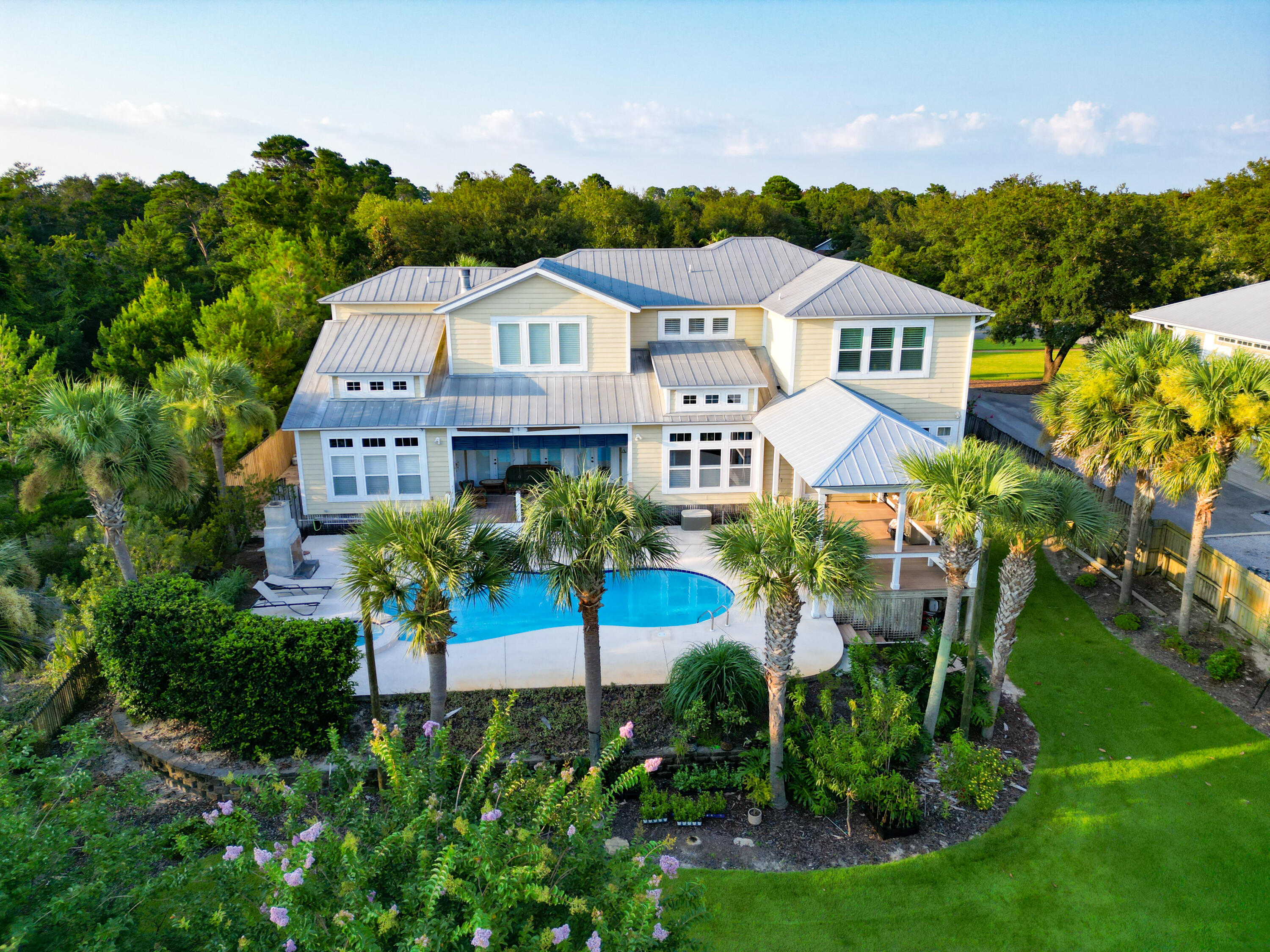 Beautiful 7 bed 5 bath home with 100' of protected deep water Indian Bayou. 12k lb covered boat lift plus dock space for up to a 50' boat and a private beach for the kids to play in the sand.First floor master with newly remodeled master bath and french doors to the pool. Large eat-in gourmet kitchen and large dining room with built in's. 2 separate back patios overlooking the pool and the bayou. Reclaimed hardwood floors, gas fireplace, 10' ceilings and exposed beams are just a few of the charming features of this home. Heated pool with hot-tub, full bath with teak floor shower and pool entrance.Second driveway for boat/RV parking, 3 car oversized garage. Whole home generator, unlimited on-demand hot water and best of all, No HOA!Pending with kick-out. Still accepting offers.