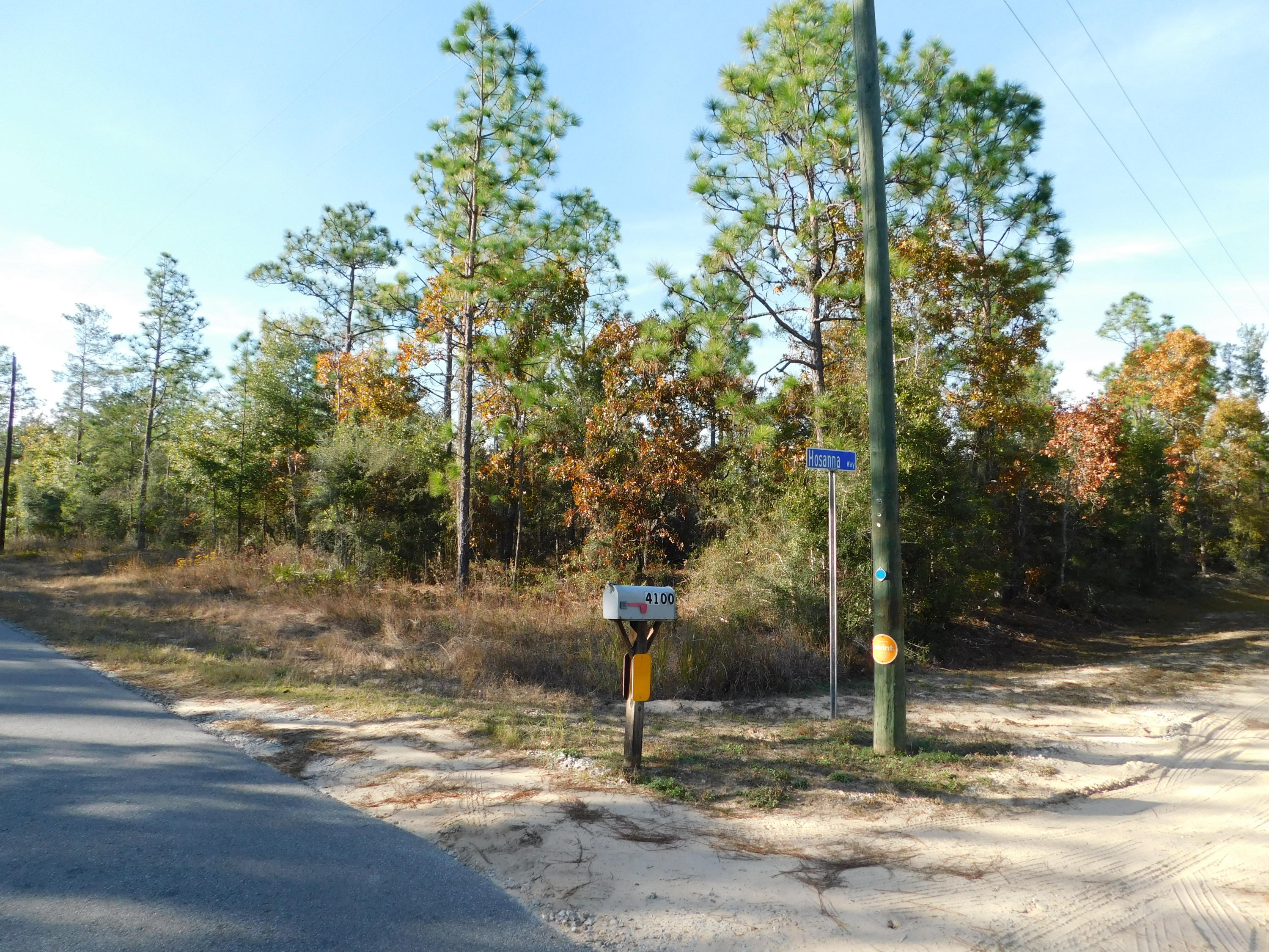 Bring your house plans!! 5.7 AC level ground to build you dream house!! Lovely neighborhood and additional land available!!