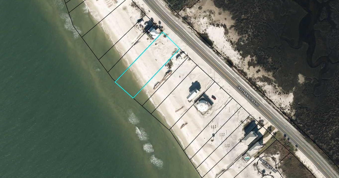 Build the beach house of your dreams on this extra-wide 100 ft Gulf-front lot in Cape San Blas! Why compromise when you can create the perfect coastal retreat tailored to your vision? Imagine an expansive deck offering breathtaking panoramic views, with a charming sand path leading directly to the water. Escape the crowded lifestyle and immerse yourself in the unspoiled natural beauty of the coast, where pristine beaches and peaceful surroundings await. Experience the serenity of the Cape as you unwind to the soothing sounds of gentle waves. Here, every sunset is a masterpiece--relax, recharge, and embrace the coastal lifestyle you've always wanted.