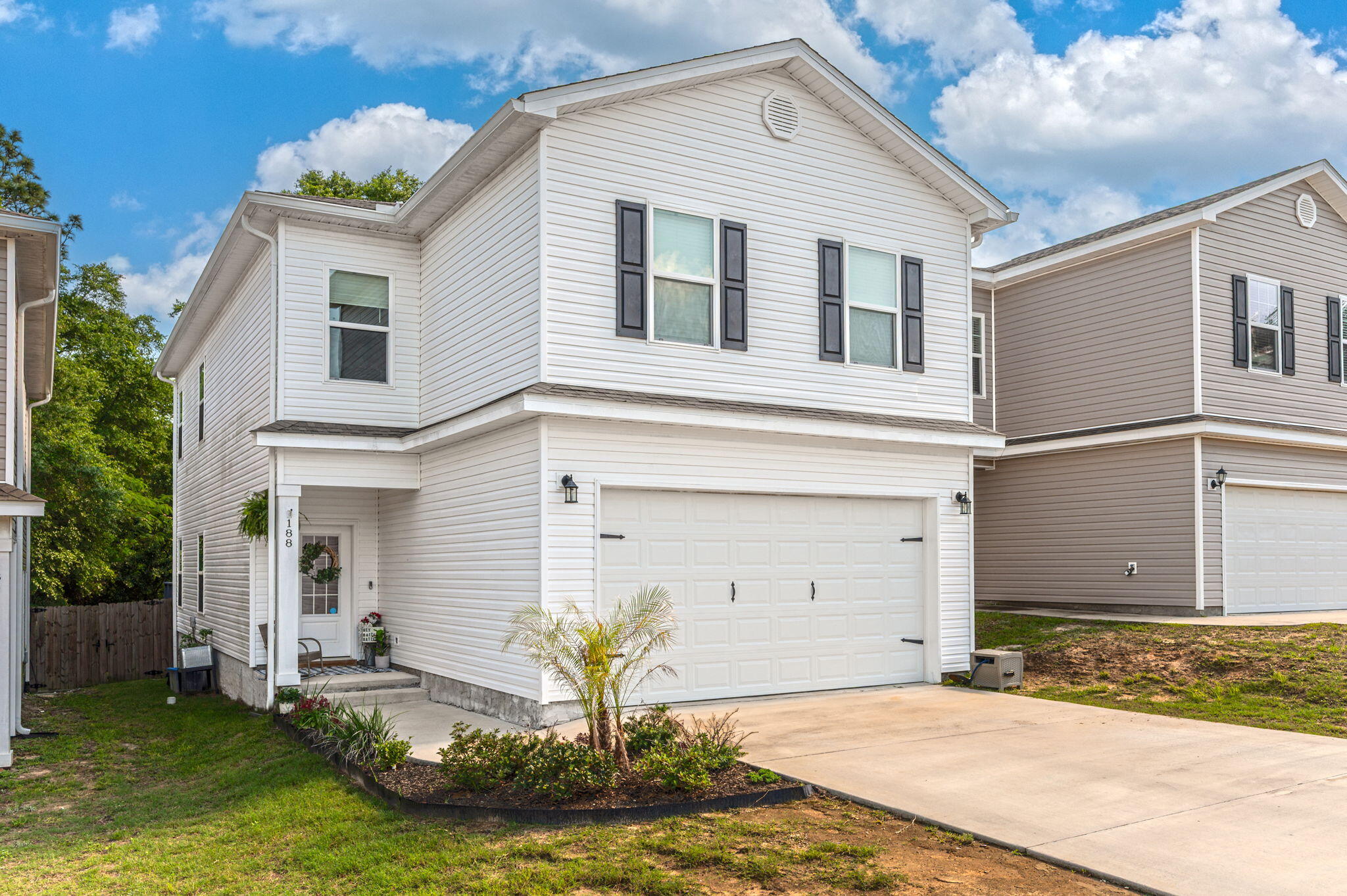 Welcome to this adorable 4-bedroom, 2.5-bath two-story home, built in 2021, offering modern comfort and thoughtful upgrades throughout. Inside, you'll find plush upgraded carpeting, an open-concept living room, dining area, and kitchen--perfect for everyday living and entertaining.Upstairs features a spacious primary suite, three additional bedrooms, a full bath, and a conveniently located laundry room with double washers and dryers that convey--a rare and convenient bonus!Step outside to enjoy a beautifully landscaped backyard complete with a large deck, ideal for relaxing or hosting guests.Move-in ready and full of charm, this home is a must-see!