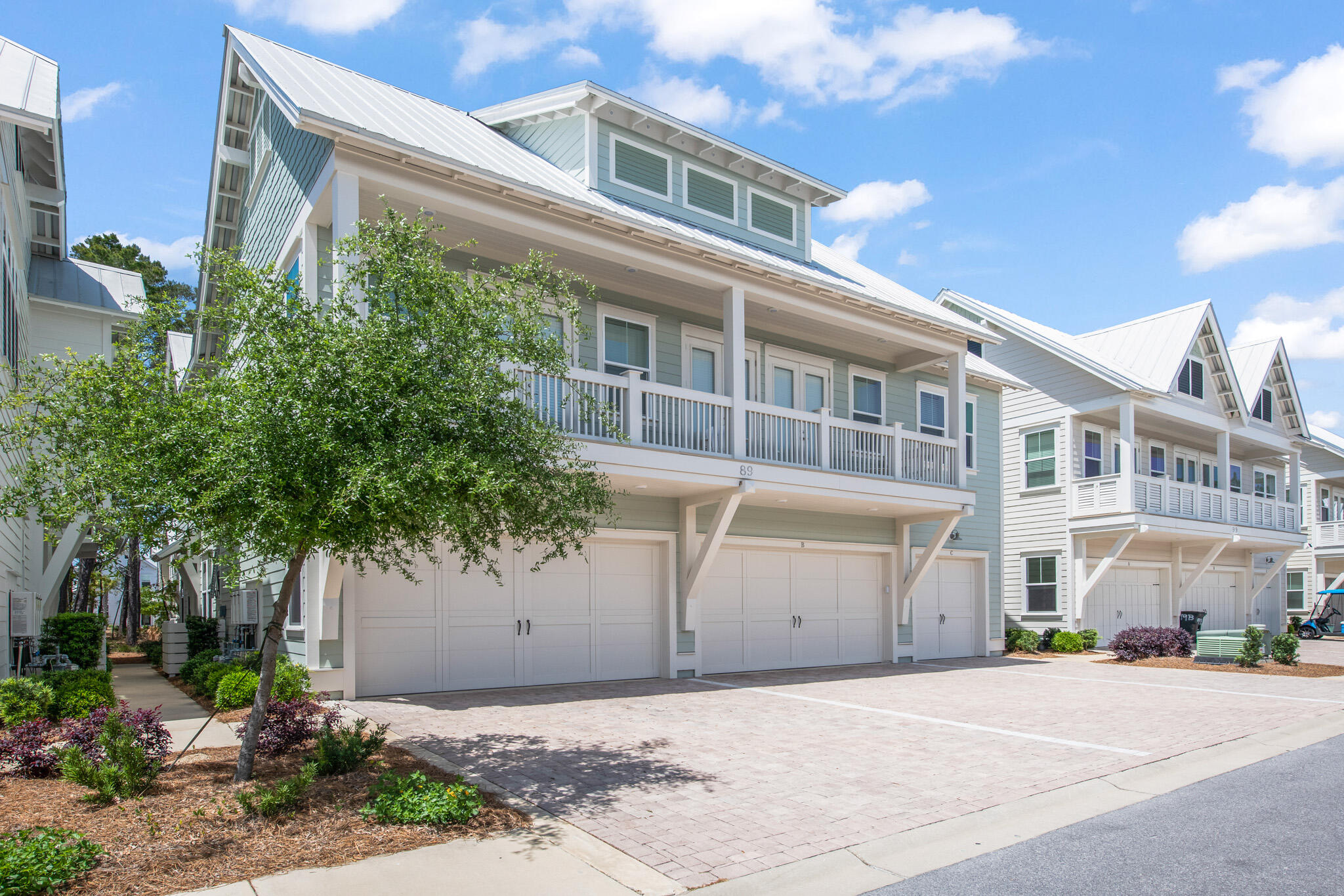 Enjoy the ultimate 30A living experience that will delight your senses in this stylish and luxurious beach home ideally located in the community of Prominence. This three-bedroom townhome features the largest and most desirable 'Bahama' floor plan and airy, sun-lit interiors providing an ambiance of comfortable sophistication with earthy and warm accents. This lot is positioned near the pool and overlooks the serene open space preservation. On the first floor you will find a large open concept living space and kitchen that includes farmhouse sinks, quartz countertops, custom cabinetry, upgraded appliances, and professionally designed lighting.
