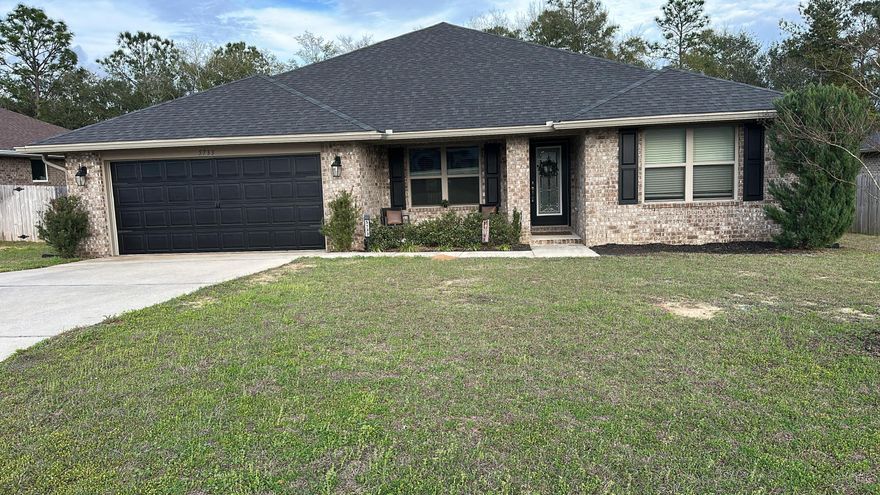 This is a stunning 5-year-old full brick home that combines modern luxury with comfort. It features 4 spacious bedrooms and a well-designed open floor plan. The interior boasts luxury vinyl flooring throughout, adding durability and style. The formal dining room is perfect for entertaining, while the open kitchen with an island and granite countertops offers a sleek, functional space for cooking and family gatherings. The primary suite includes a private bathroom with a separate tub and shower, providing a relaxing retreat. Outside, the private backyard with an open patio is ideal for outdoor activities and relaxing. The home also includes a 2-car garage and is conveniently located near the interstate and other amenities. Seller has an assumable VA 2.75 interest rate mortage.