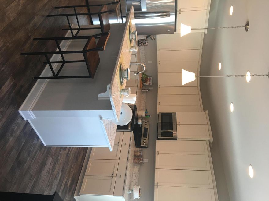 Award winning model home. Design center will be converted back to garage space after contract is approved. Flooring in front bedroom will be replaced with carpet! No furniture conveys.