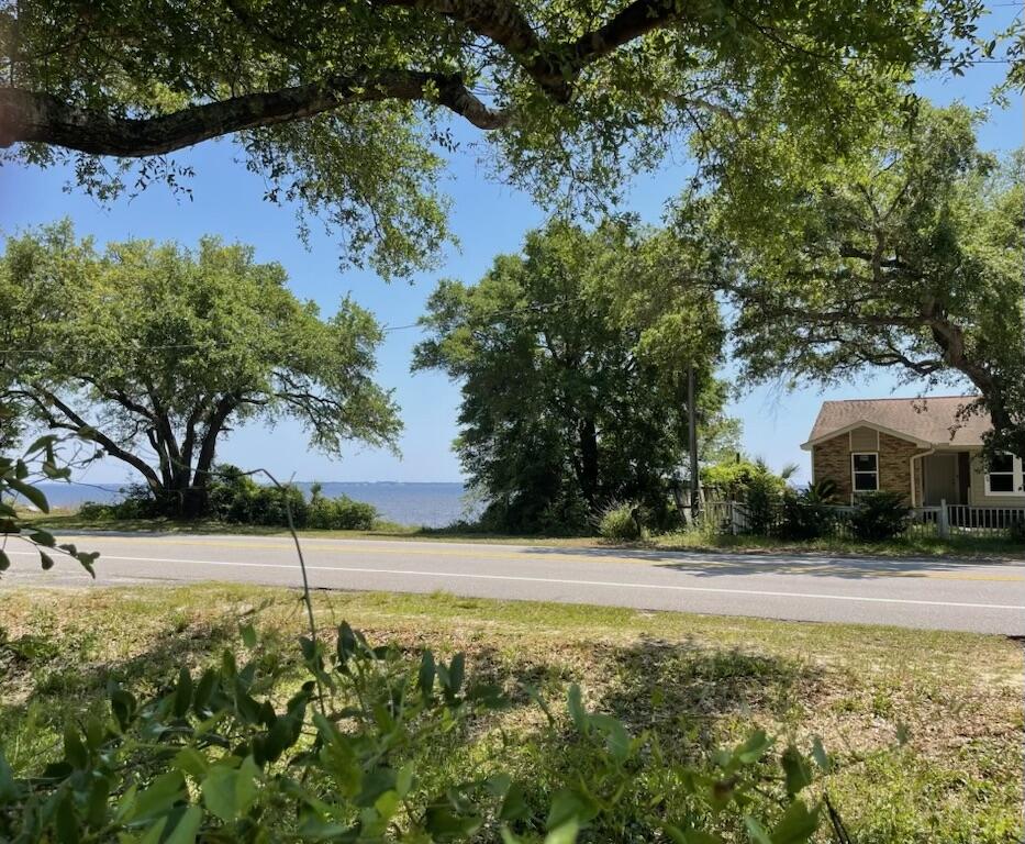 A beautiful piece of property with a potential view of Choctawhatchee Bay. There are 2 parcels under one deed with just over .60 of an acre. Enter from Hwy 20, this parcel has a 200 amp service, septic tank, city water and the lot is approx 75 x 207. Enter from Satsuma, the lot has city water & power to the boundary & is 75 x 150. The survey shows a home but was demolished & removed in 2024 . Seller will not sell the lots individually. Approx 20-25 minute drive to the beaches of the Gulf of America or Niceville. Enjoy owning a piece of land so close to recreation, dining, medical, schools & shopping with no HOA. Buyer(s) are responsible to personally verify all details for property & dimensions. Any information contained in this listing is believed to be accurate but not guaranteed.