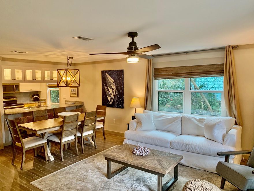 This charming townhouse has been remodeled and is being sold fully furnished.  This unit features new granite countertops, new appliances, and tile and hardwood floors throughout.  The main floor features an open living, kitchen and dining area along with a 1/2 bath and storage closet.  The second floor has 2 bedrooms with 2 full bathrooms and both bedrooms have their own private balcony.  This unit is also a corner/end unit so you have additional privacy on the Western side and you are just steps away from one of the community pools.