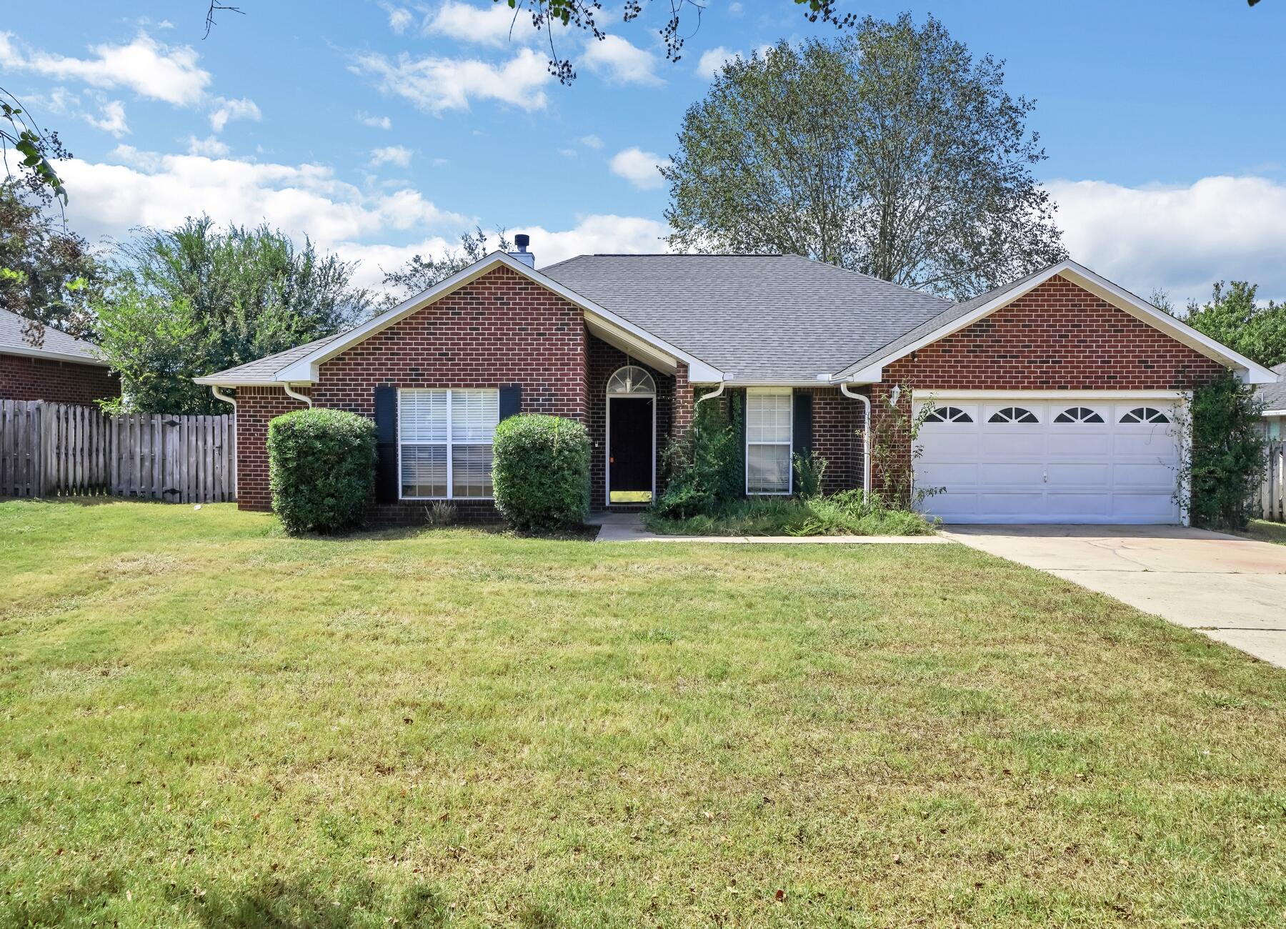 AVAILABLE NOW ... 3bd/2bth home located in Crestview. Easy commute to schools, stores, Eglin AFB, Duke Airfield/7SFG(A). Home features a split floor plan w/flex space and formal dining area which features a custom shiplap accent wall & wainscoting. As you enter the property you are greeted by a large tiled foyer and views of the open living space and fireplace. Kitchen is tiled as well and features a large peninsula for additional seating. Master bathroom has a separate tub and shower & has a double vanity. The spare bedrooms have a jack-and-jill bathroom. Yard is fenced in and has several mature trees, perennial plants, and bushes! NO smoking. Pets allowed upon approval with a non-refundable pet fee. 600 minimum FICO credit score required in addition to meeting rental criteria.