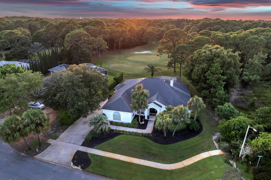 Home is under contract but accepting backup offers.  All on one level, this freshly painted residence in Indian Bayou exceeds any wishlist with a host of recent improvements and noteworthy features. Backing onto well-tended hole 13 at the semi-private Earl Stone-designed Indian Bayou Golf Club with a wooded vacant lot to one side, it also enjoys ample privacy. A generous paved driveway leads to an oversized two-car garage. Upgrades are evident throughout this well-presented home including new fans, interior and exterior lighting and new LVP flooring installed in 2022. Bahama shutters filter the natural daylight and new window treatments and blinds provide privacy throughout the home.